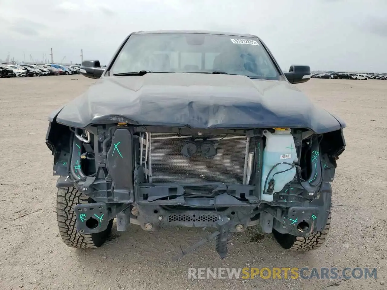 5 Photograph of a damaged car 1C6SRFFT2MN766640 RAM 1500 2021