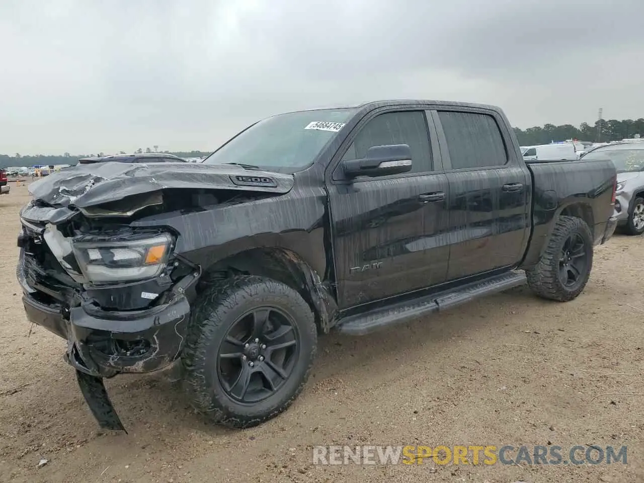 1 Photograph of a damaged car 1C6SRFFT3MN515514 RAM 1500 2021