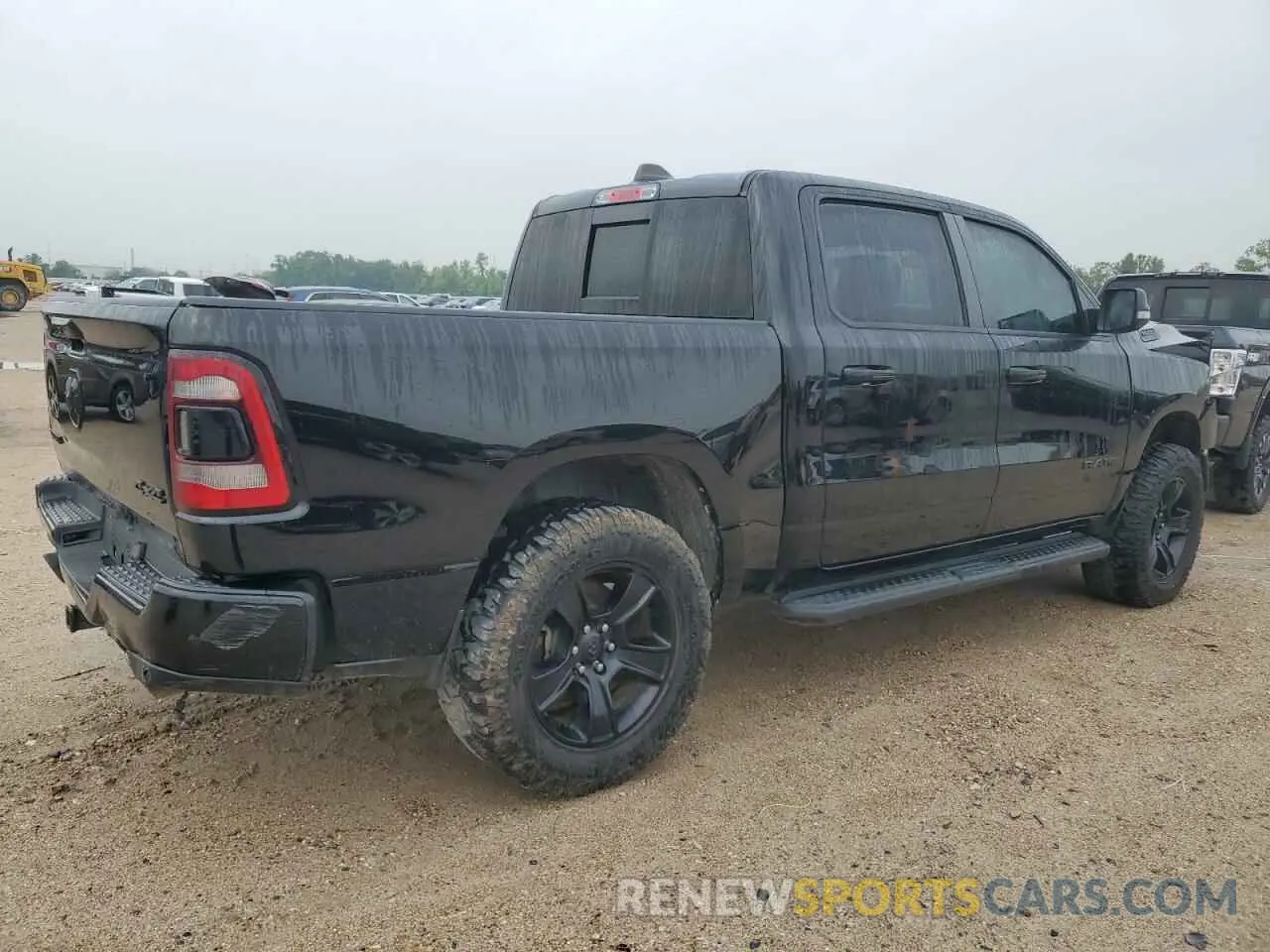 3 Photograph of a damaged car 1C6SRFFT3MN515514 RAM 1500 2021