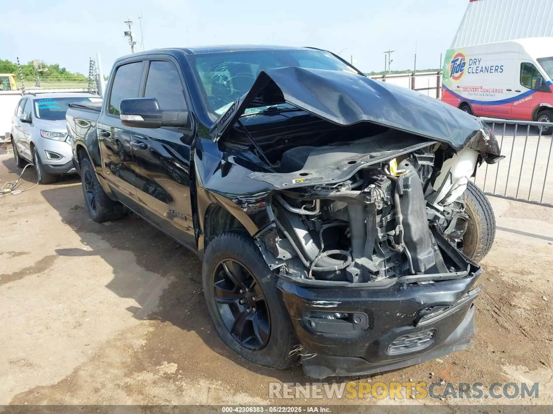 1 Photograph of a damaged car 1C6SRFFT3MN521300 RAM 1500 2021