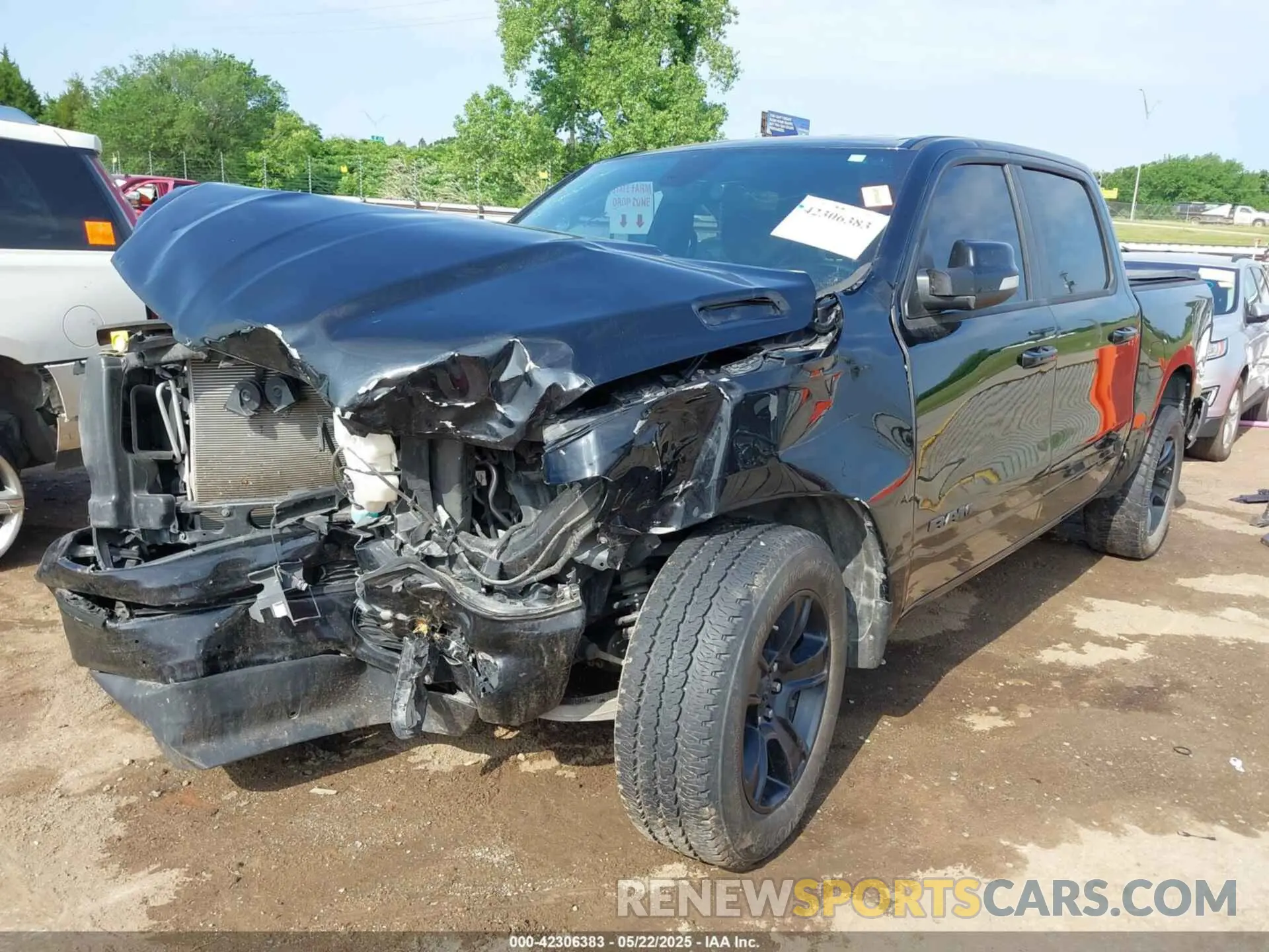 2 Photograph of a damaged car 1C6SRFFT3MN521300 RAM 1500 2021