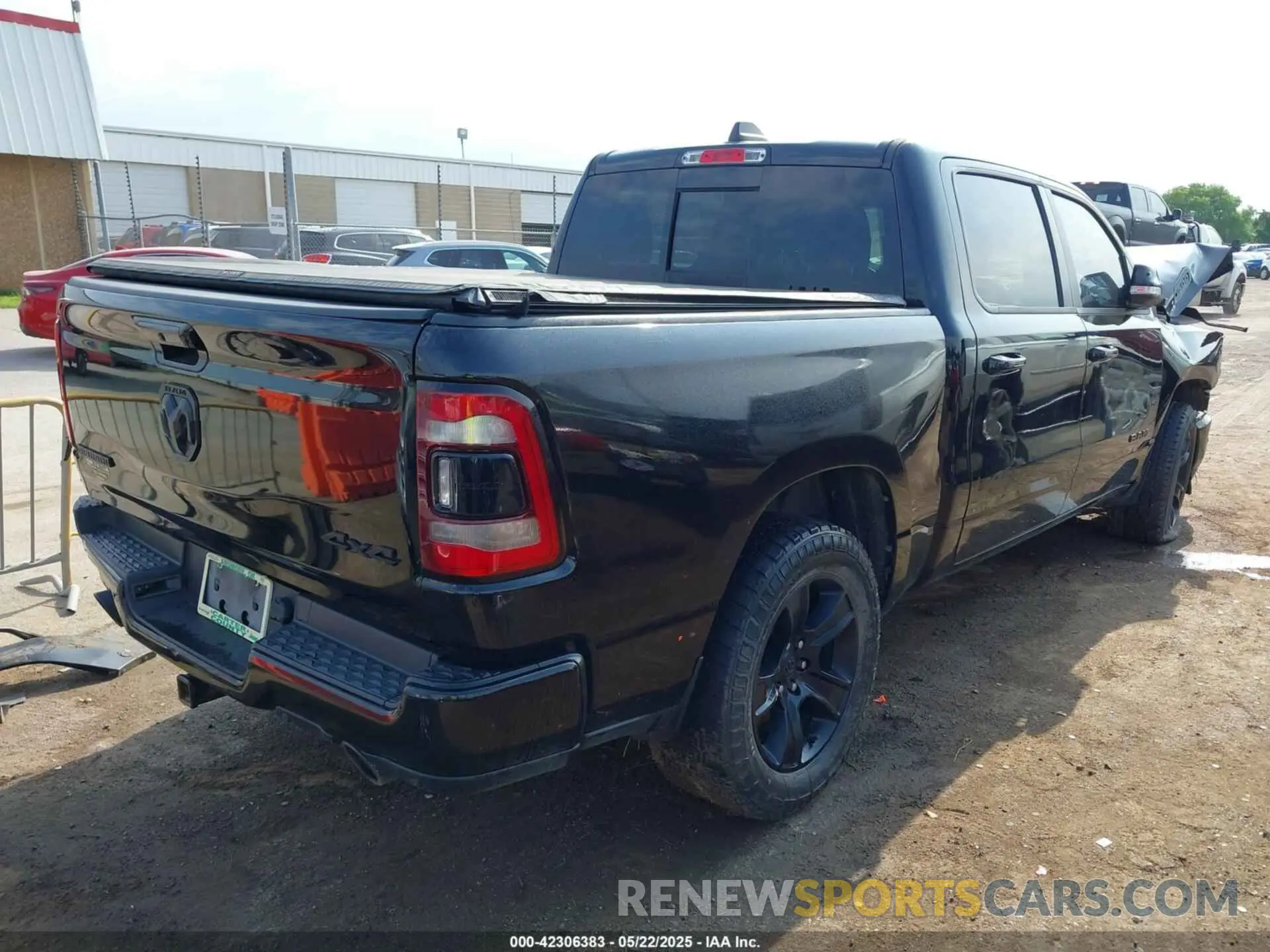 4 Photograph of a damaged car 1C6SRFFT3MN521300 RAM 1500 2021