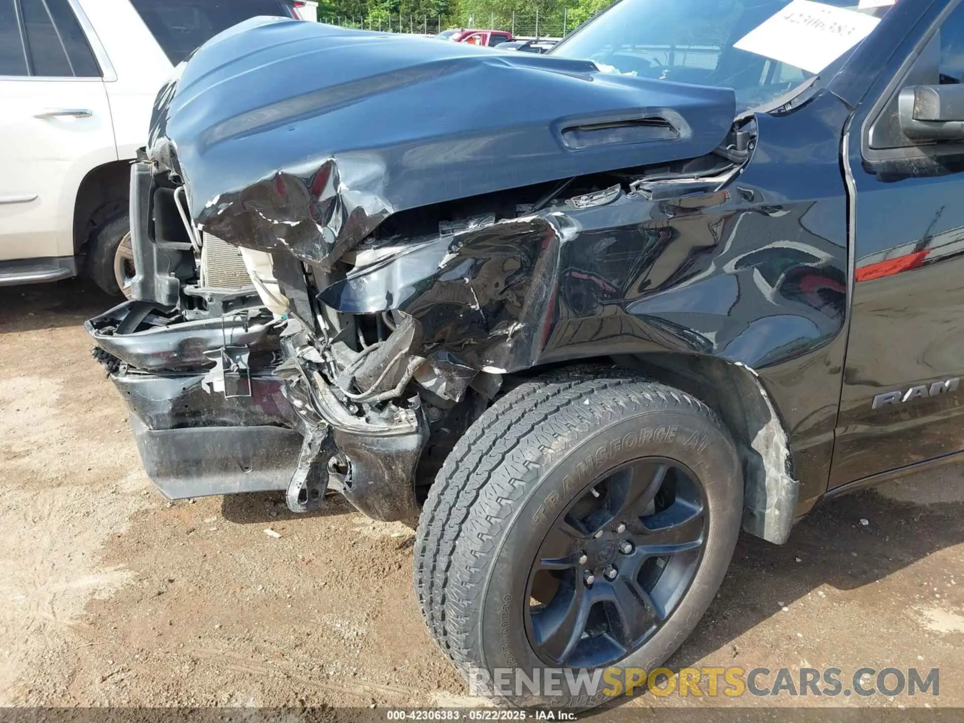 6 Photograph of a damaged car 1C6SRFFT3MN521300 RAM 1500 2021