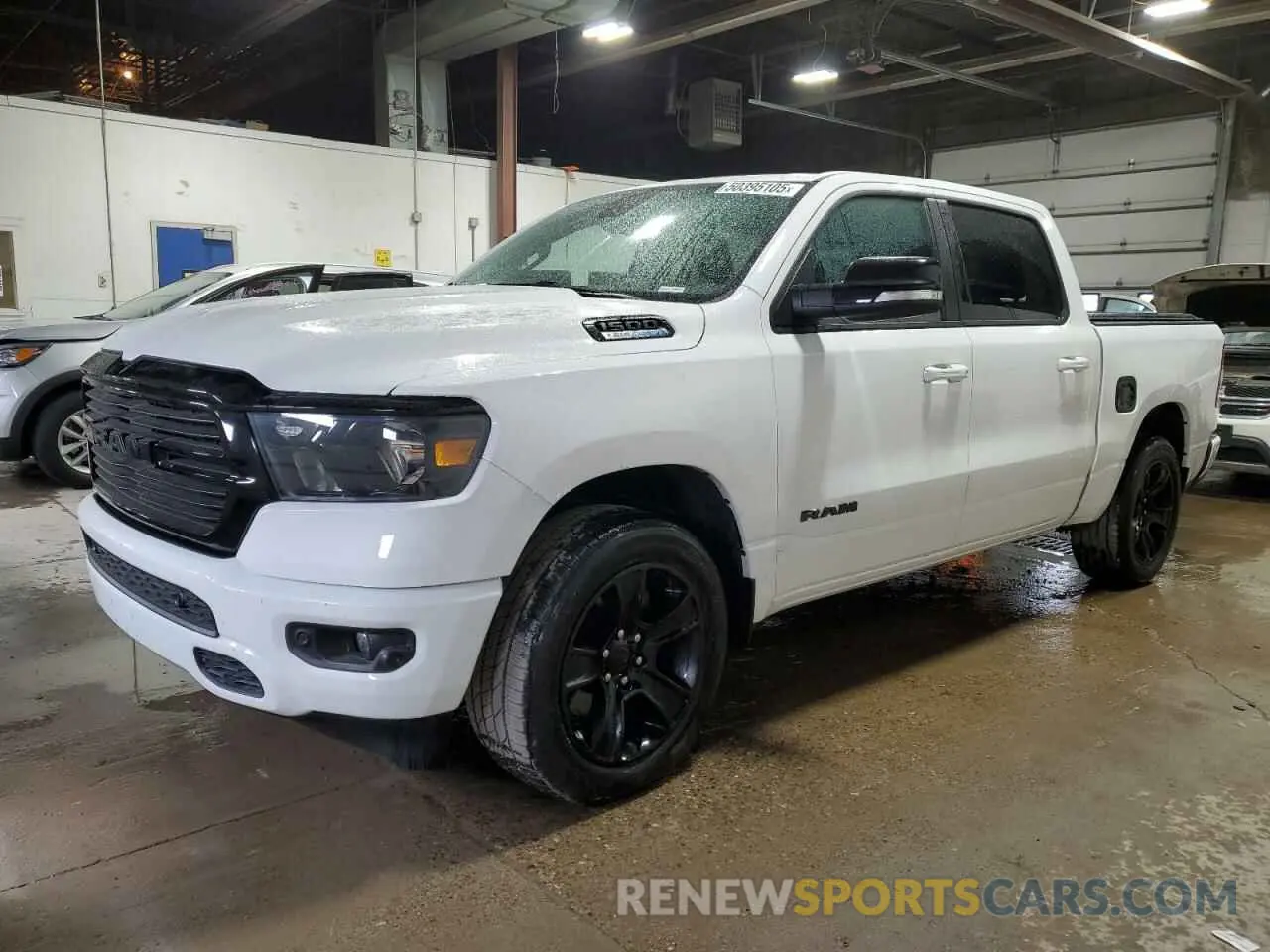 1 Photograph of a damaged car 1C6SRFFT3MN675148 RAM 1500 2021