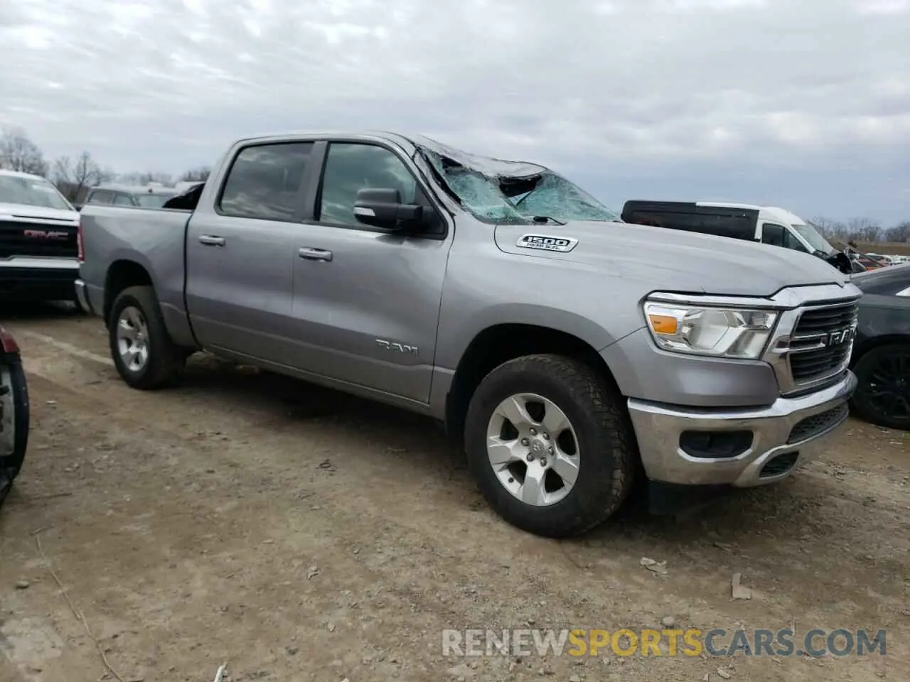 4 Photograph of a damaged car 1C6SRFFT3MN701635 RAM 1500 2021
