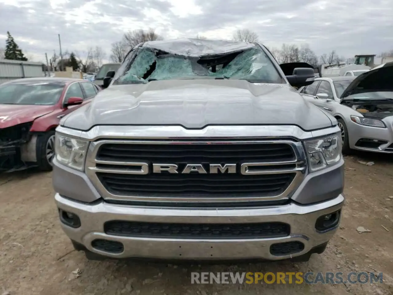 5 Photograph of a damaged car 1C6SRFFT3MN701635 RAM 1500 2021