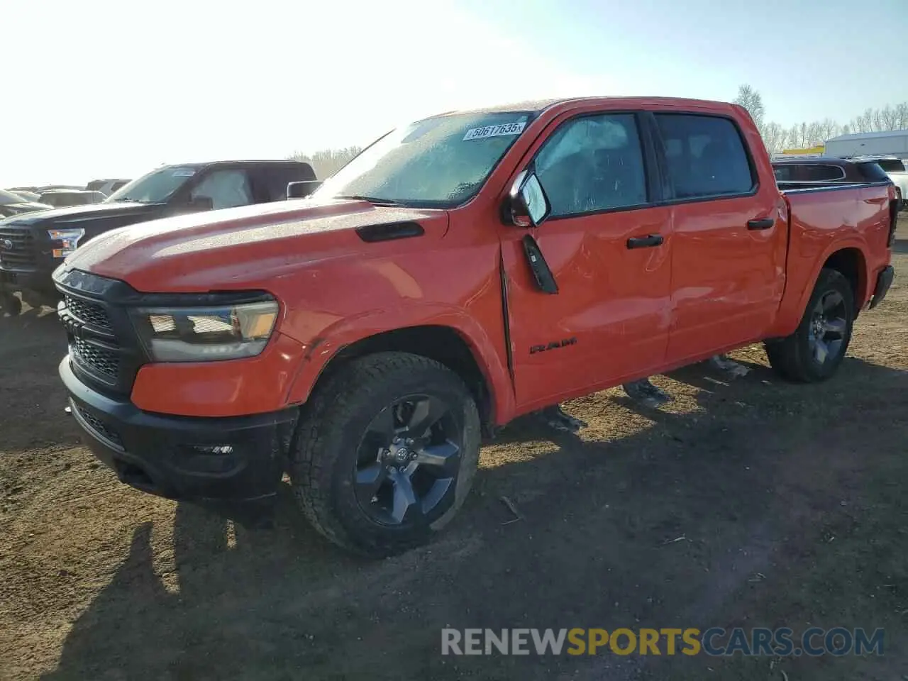1 Photograph of a damaged car 1C6SRFFT3MN762127 RAM 1500 2021