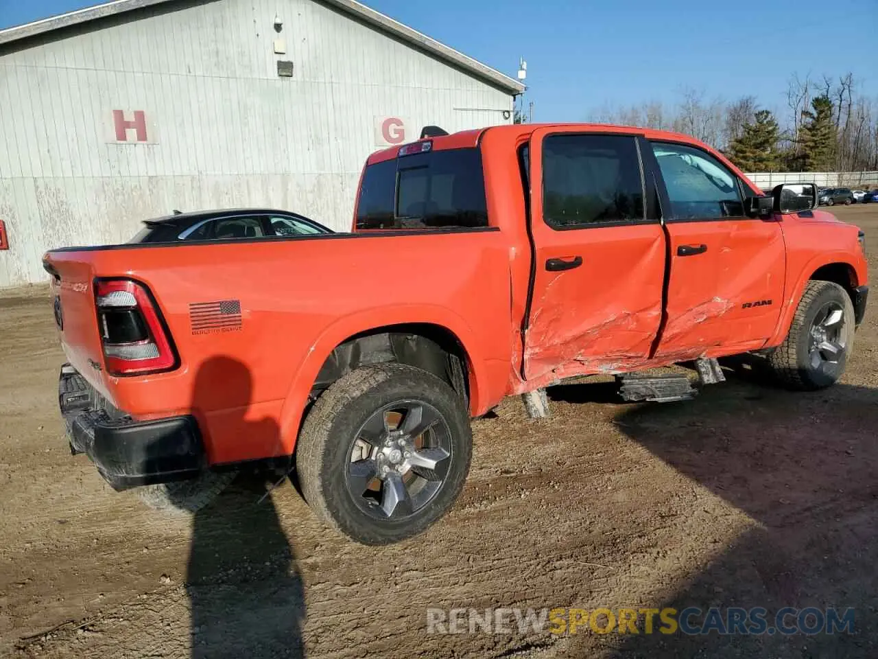 3 Photograph of a damaged car 1C6SRFFT3MN762127 RAM 1500 2021