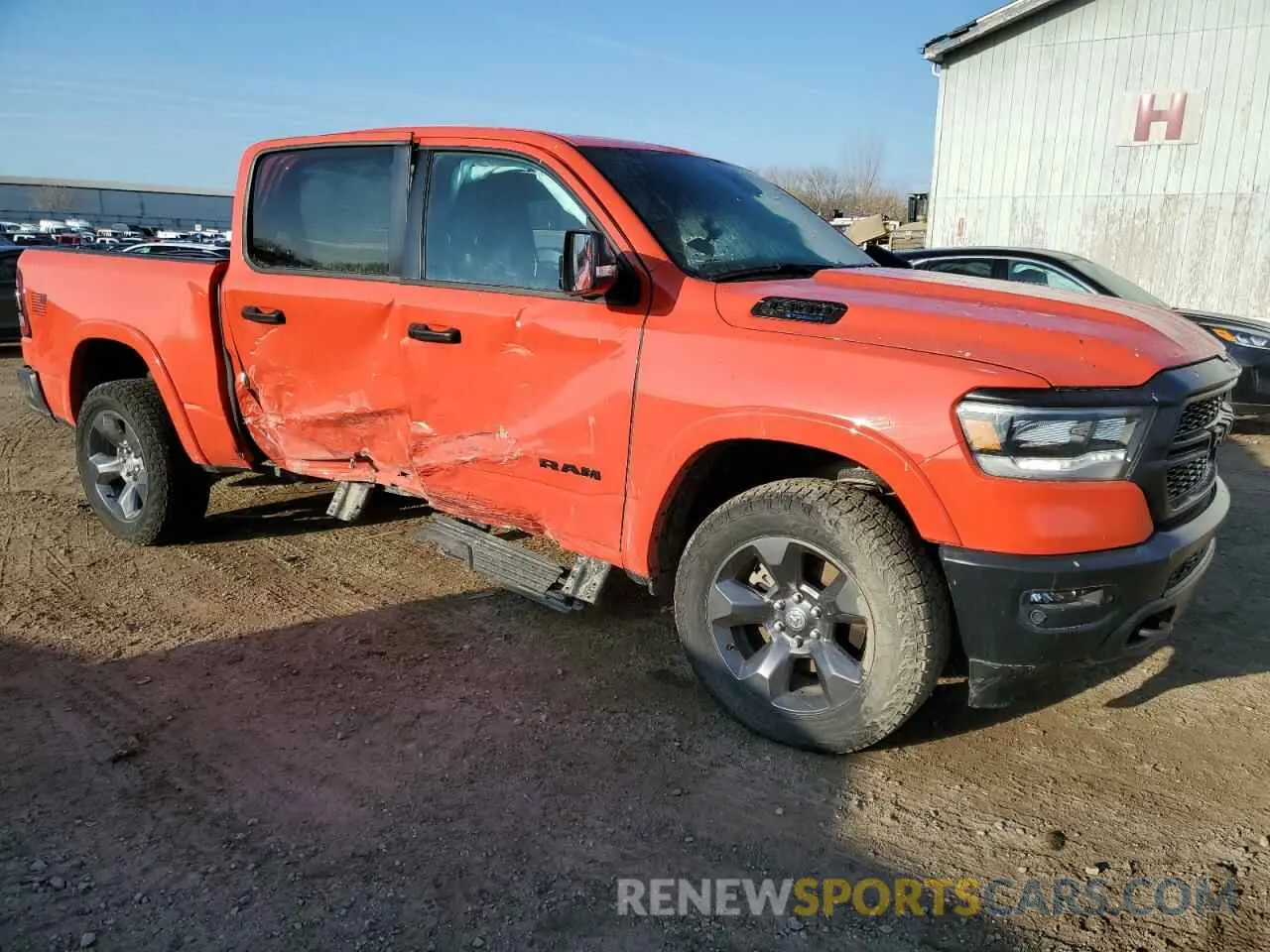 4 Photograph of a damaged car 1C6SRFFT3MN762127 RAM 1500 2021