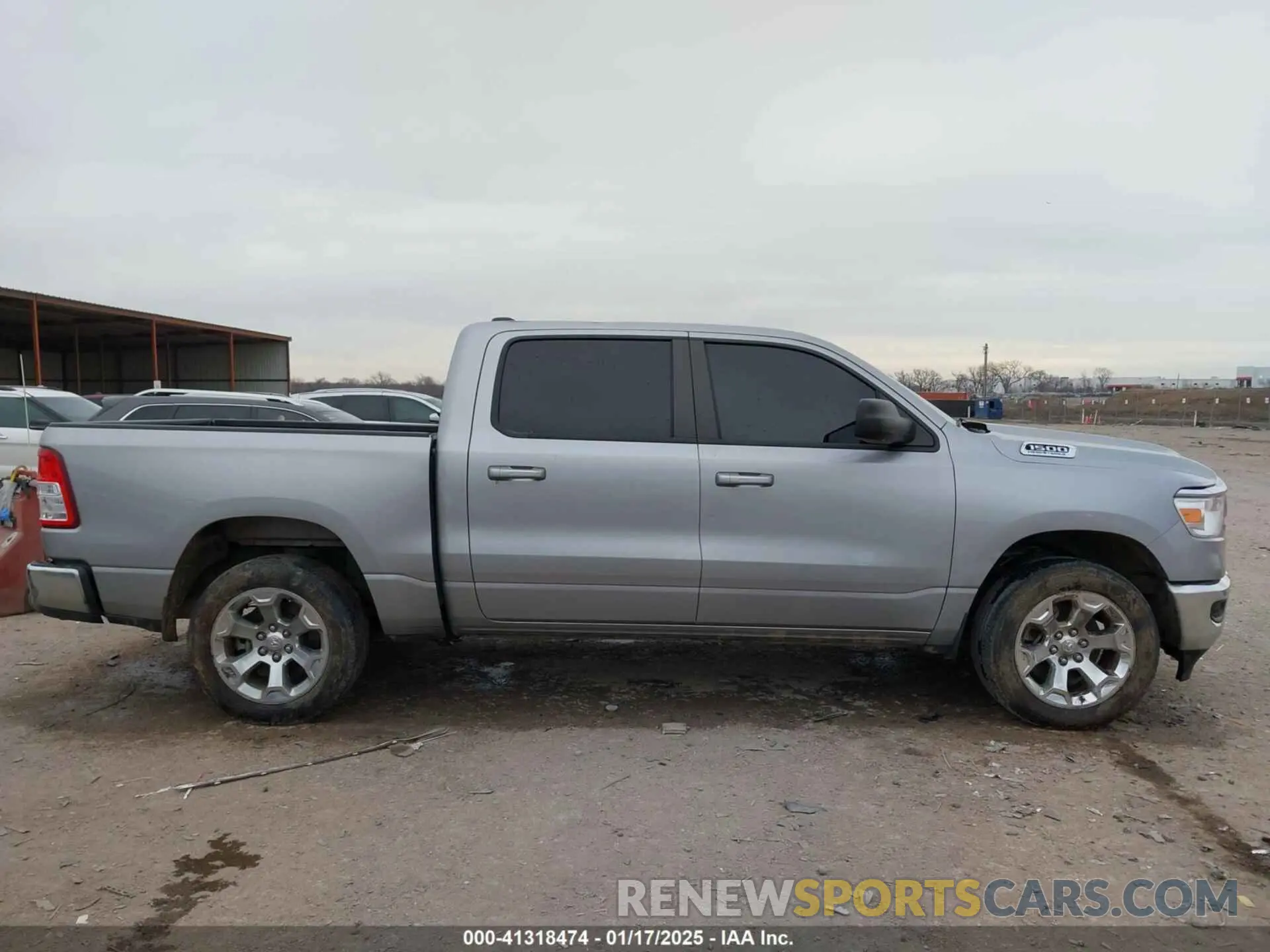 13 Photograph of a damaged car 1C6SRFFT3MN796441 RAM 1500 2021