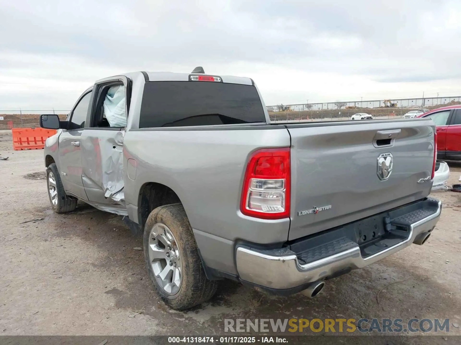 3 Photograph of a damaged car 1C6SRFFT3MN796441 RAM 1500 2021