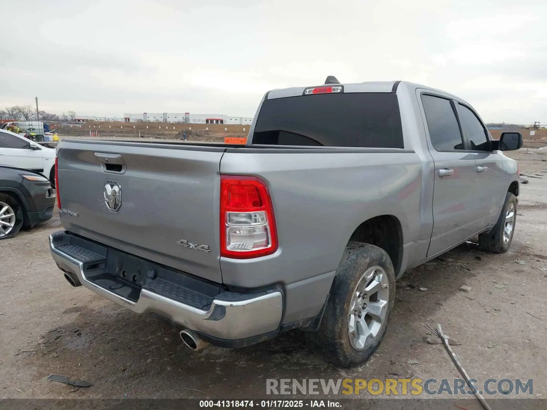 4 Photograph of a damaged car 1C6SRFFT3MN796441 RAM 1500 2021