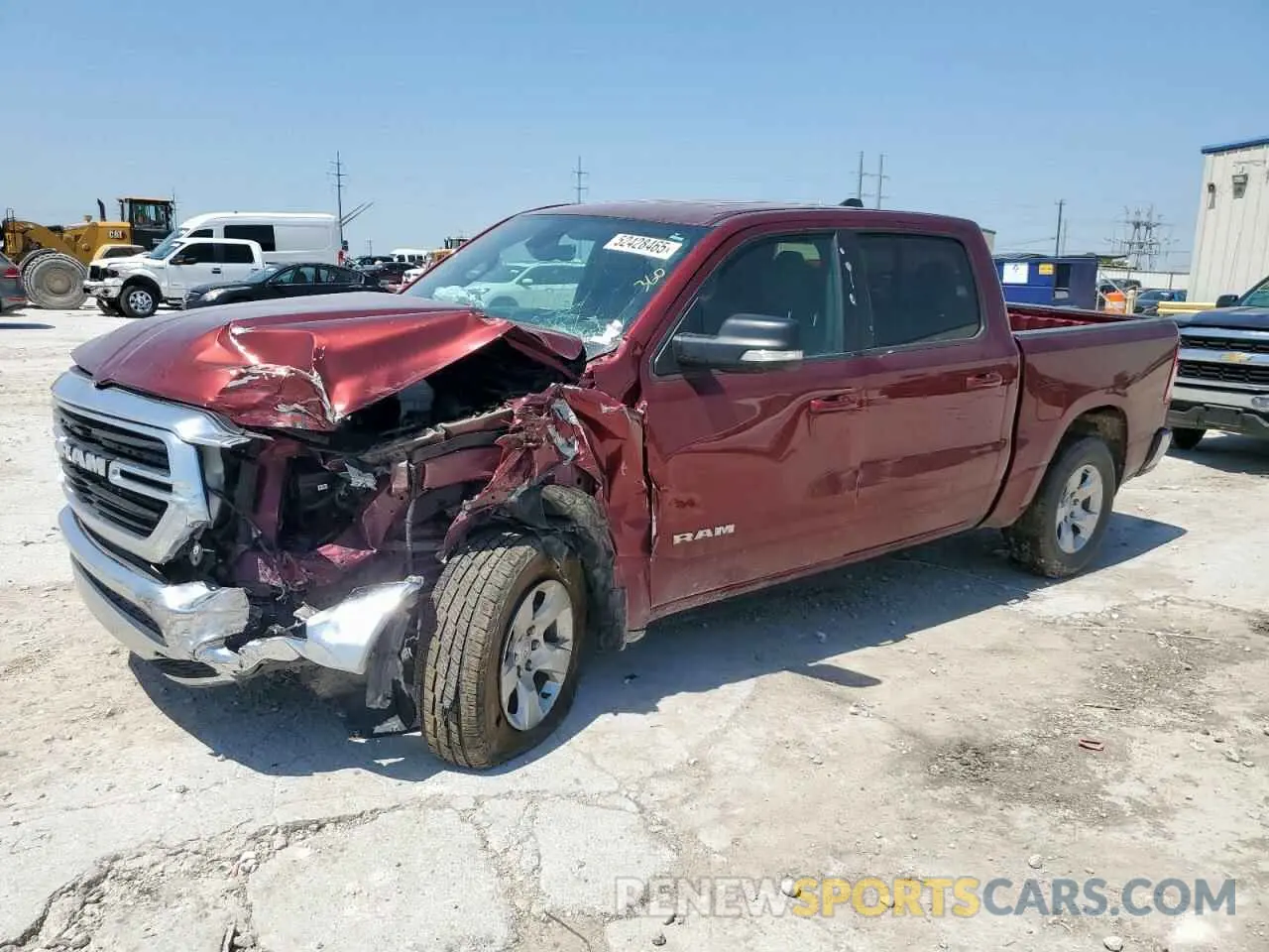 1 Photograph of a damaged car 1C6SRFFT4MN520933 RAM 1500 2021