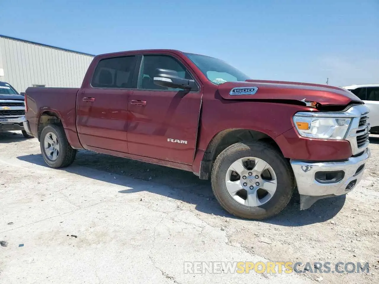 4 Photograph of a damaged car 1C6SRFFT4MN520933 RAM 1500 2021