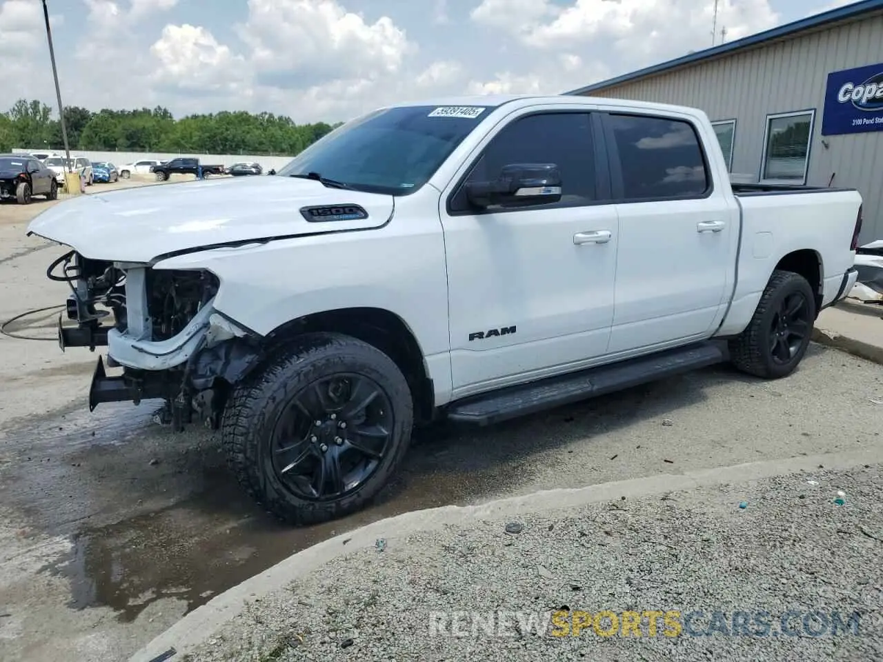 1 Photograph of a damaged car 1C6SRFFT4MN585412 RAM 1500 2021