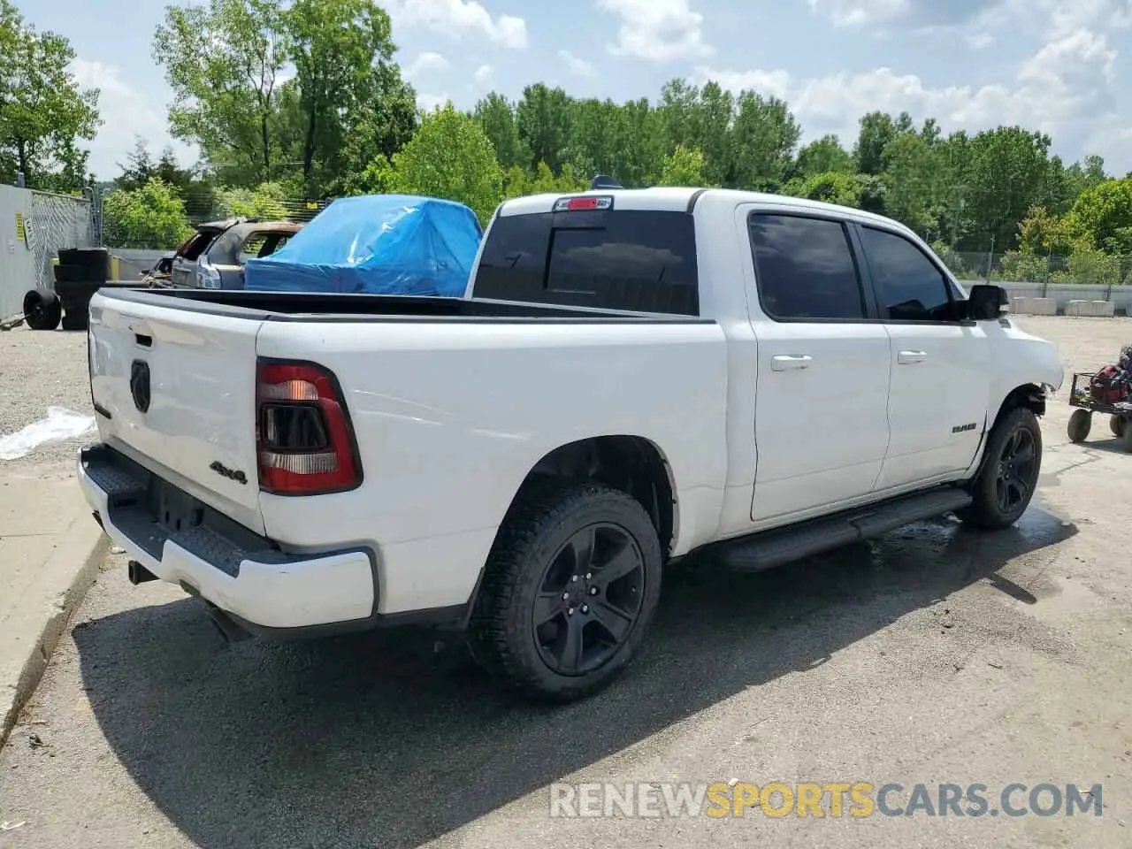 3 Photograph of a damaged car 1C6SRFFT4MN585412 RAM 1500 2021