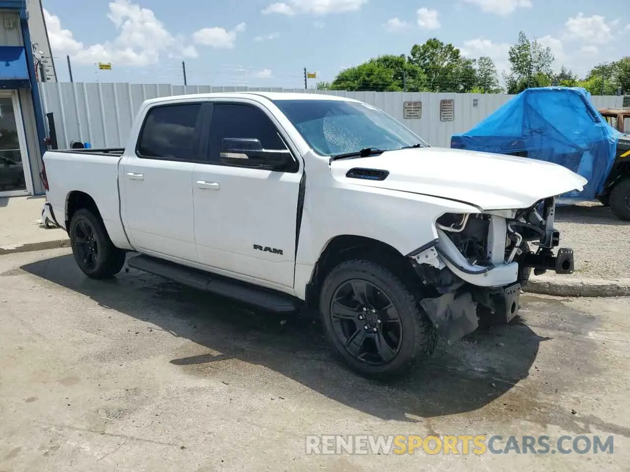 4 Photograph of a damaged car 1C6SRFFT4MN585412 RAM 1500 2021