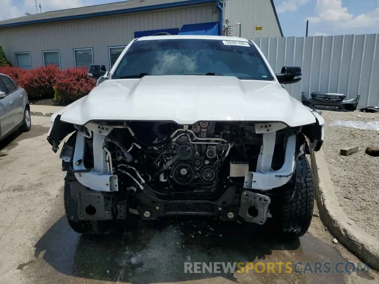 5 Photograph of a damaged car 1C6SRFFT4MN585412 RAM 1500 2021
