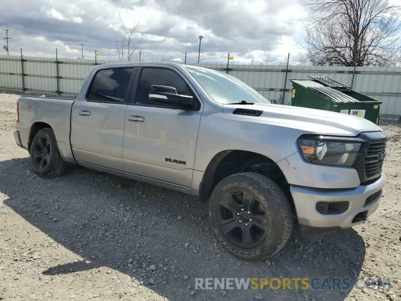 4 Photograph of a damaged car 1C6SRFFT4MN604184 RAM 1500 2021