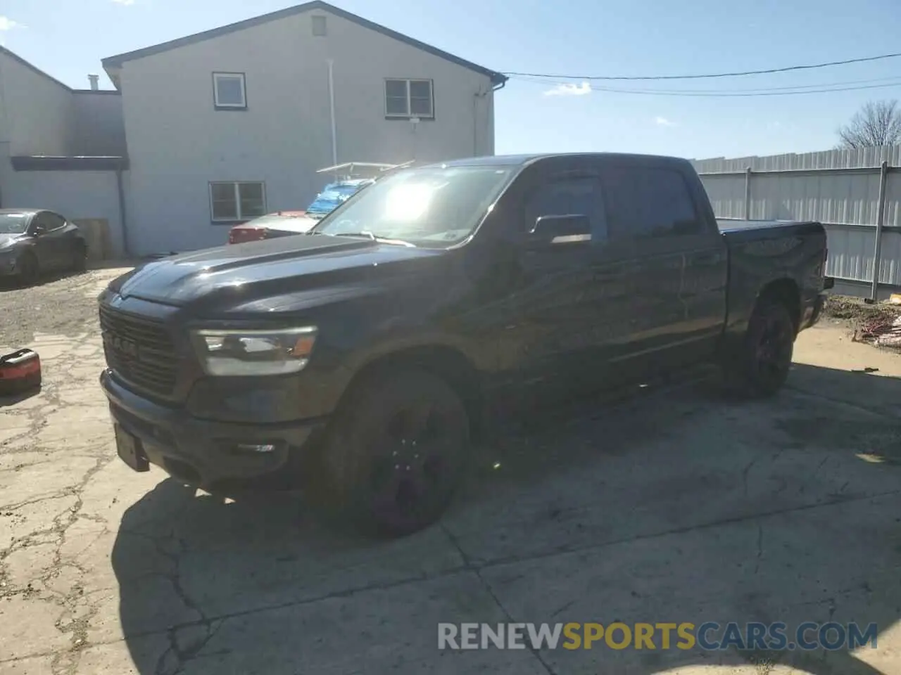 1 Photograph of a damaged car 1C6SRFFT4MN681069 RAM 1500 2021