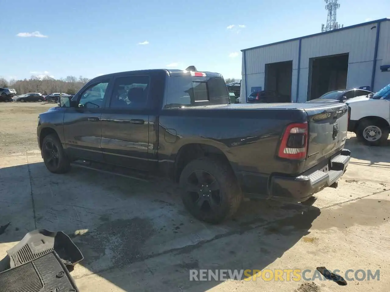 2 Photograph of a damaged car 1C6SRFFT4MN681069 RAM 1500 2021