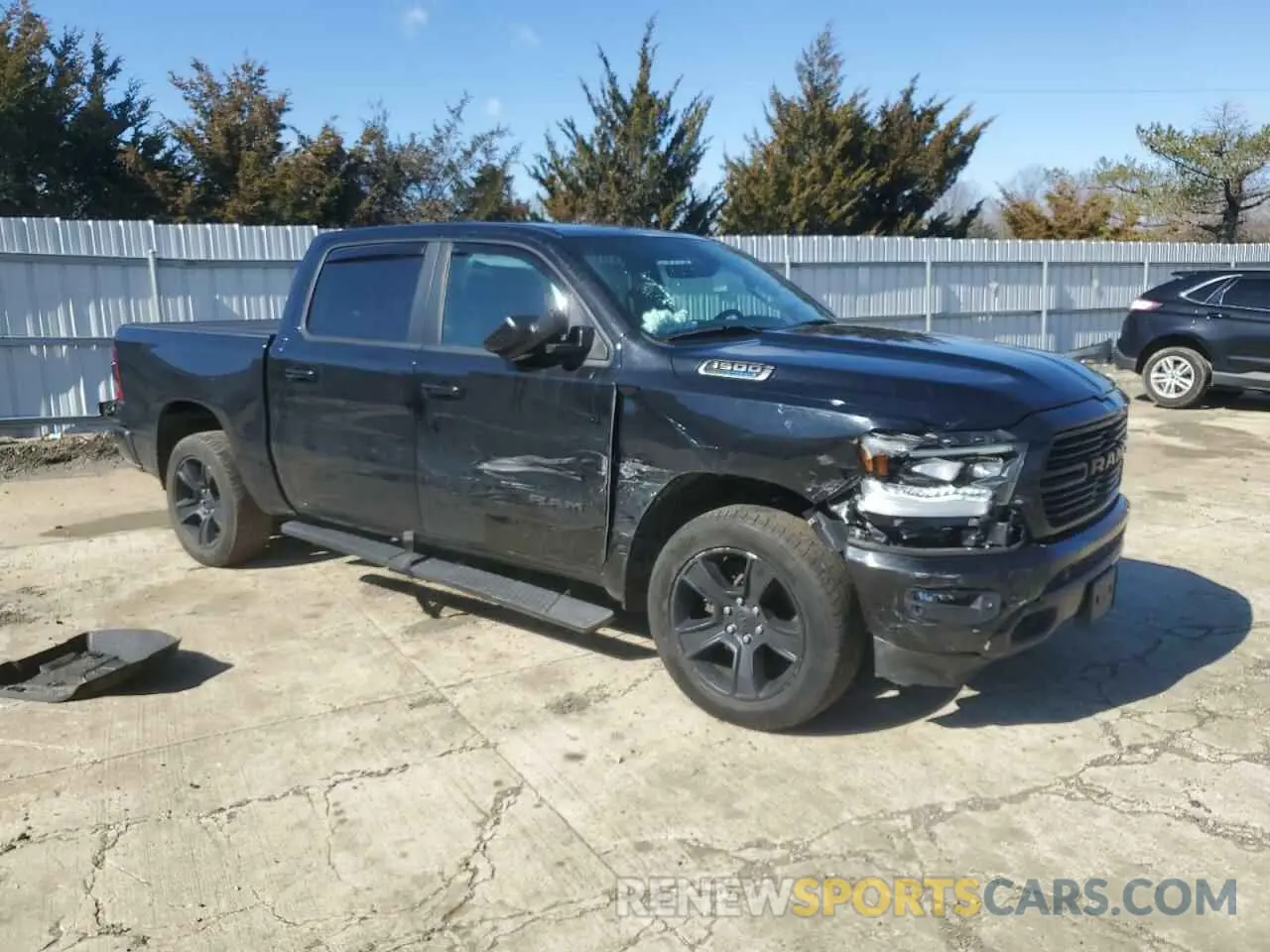 4 Photograph of a damaged car 1C6SRFFT4MN681069 RAM 1500 2021