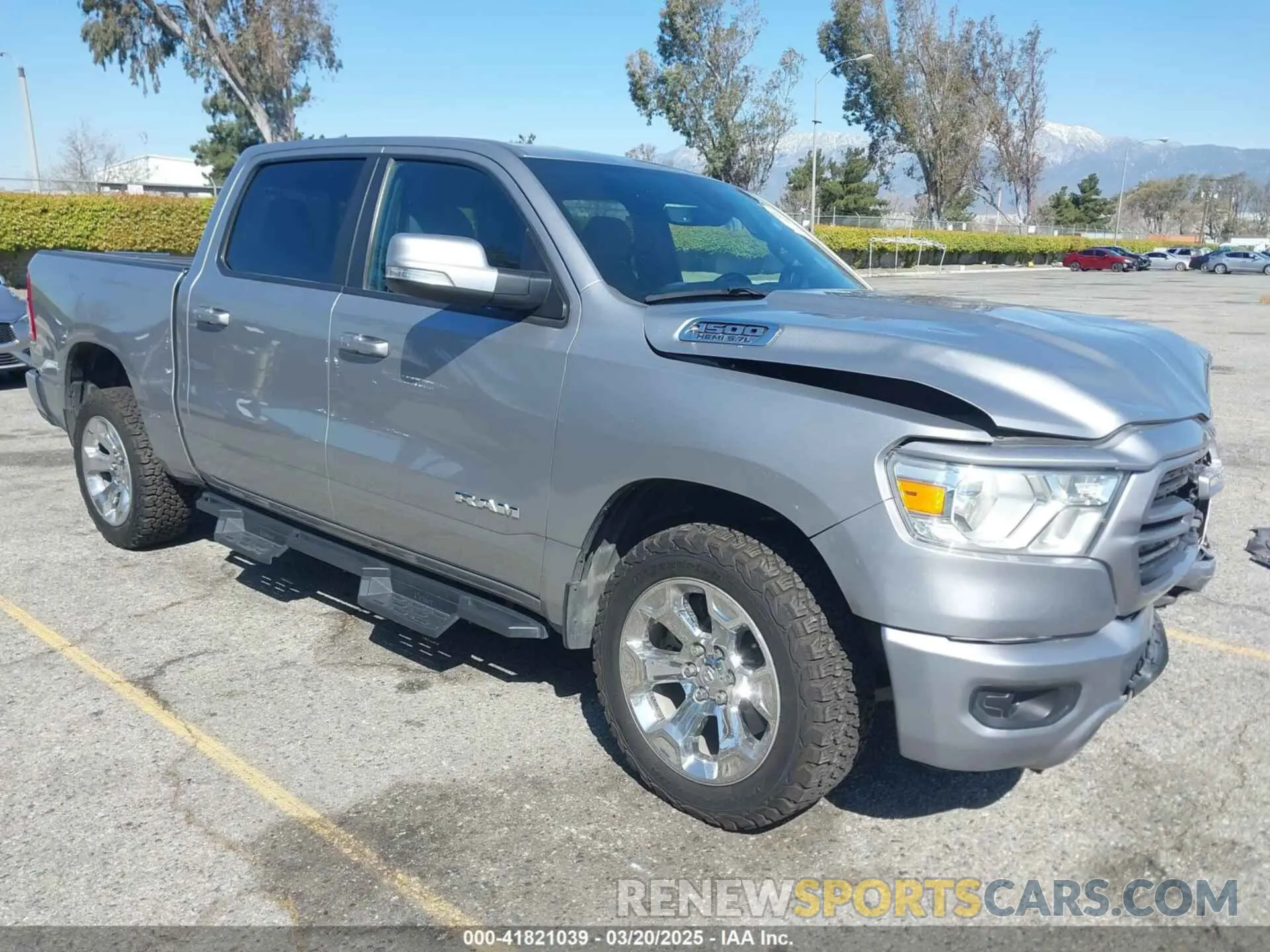 1 Photograph of a damaged car 1C6SRFFT4MN688152 RAM 1500 2021