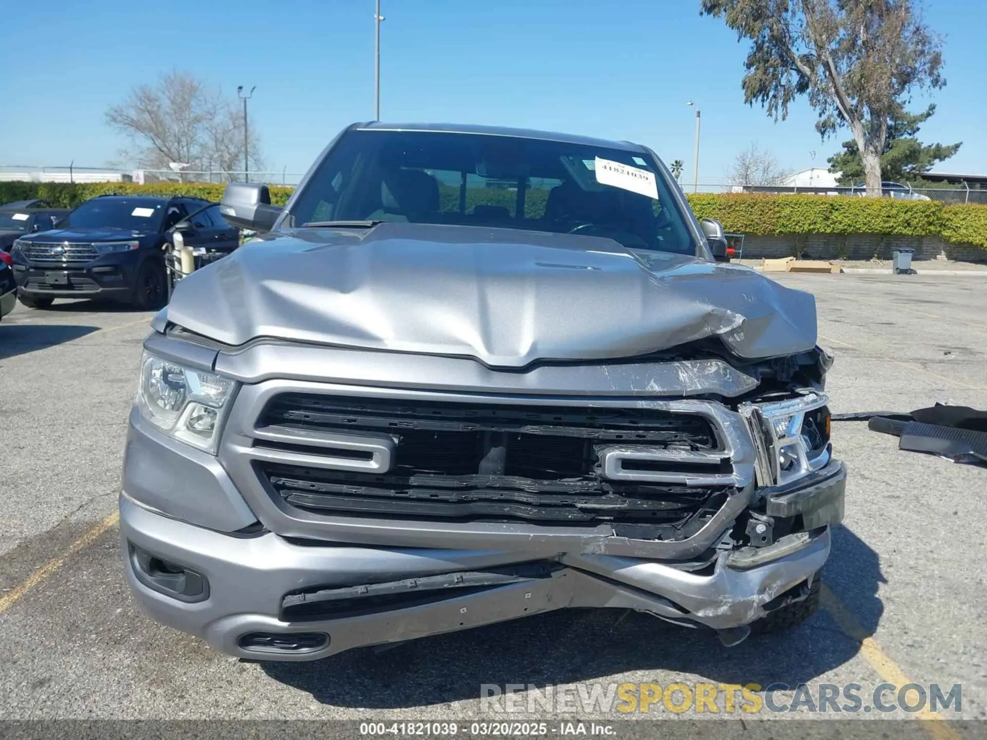 13 Photograph of a damaged car 1C6SRFFT4MN688152 RAM 1500 2021