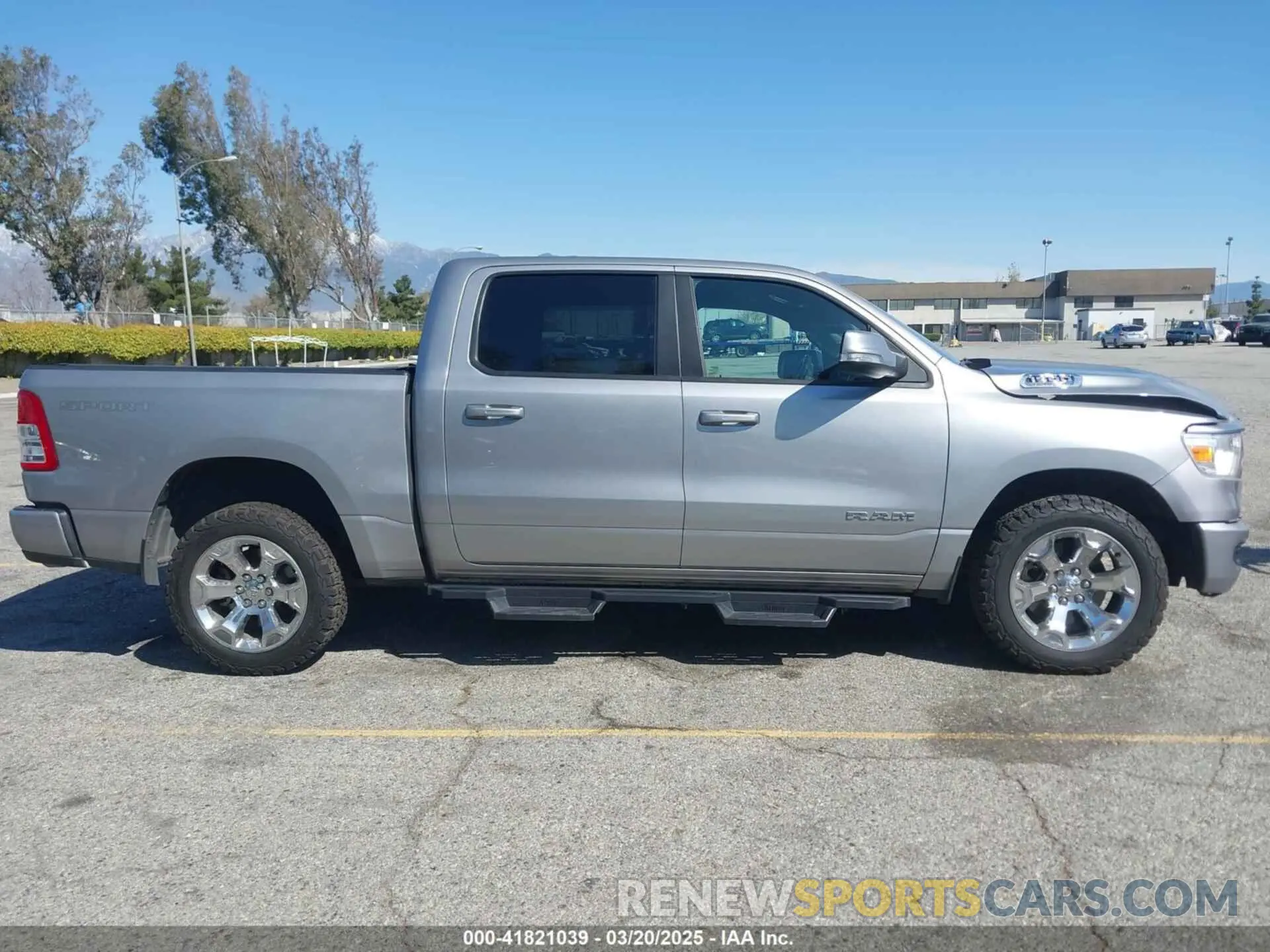 14 Photograph of a damaged car 1C6SRFFT4MN688152 RAM 1500 2021