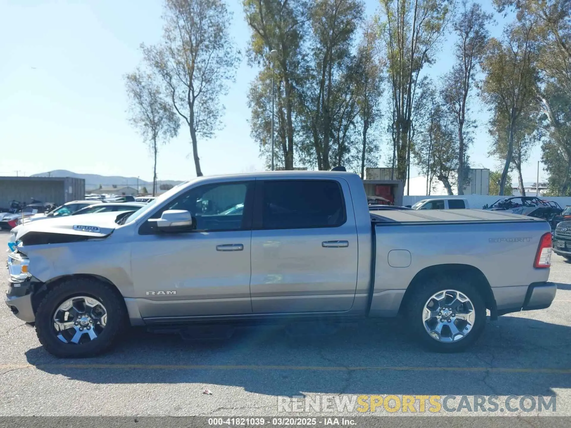 15 Photograph of a damaged car 1C6SRFFT4MN688152 RAM 1500 2021