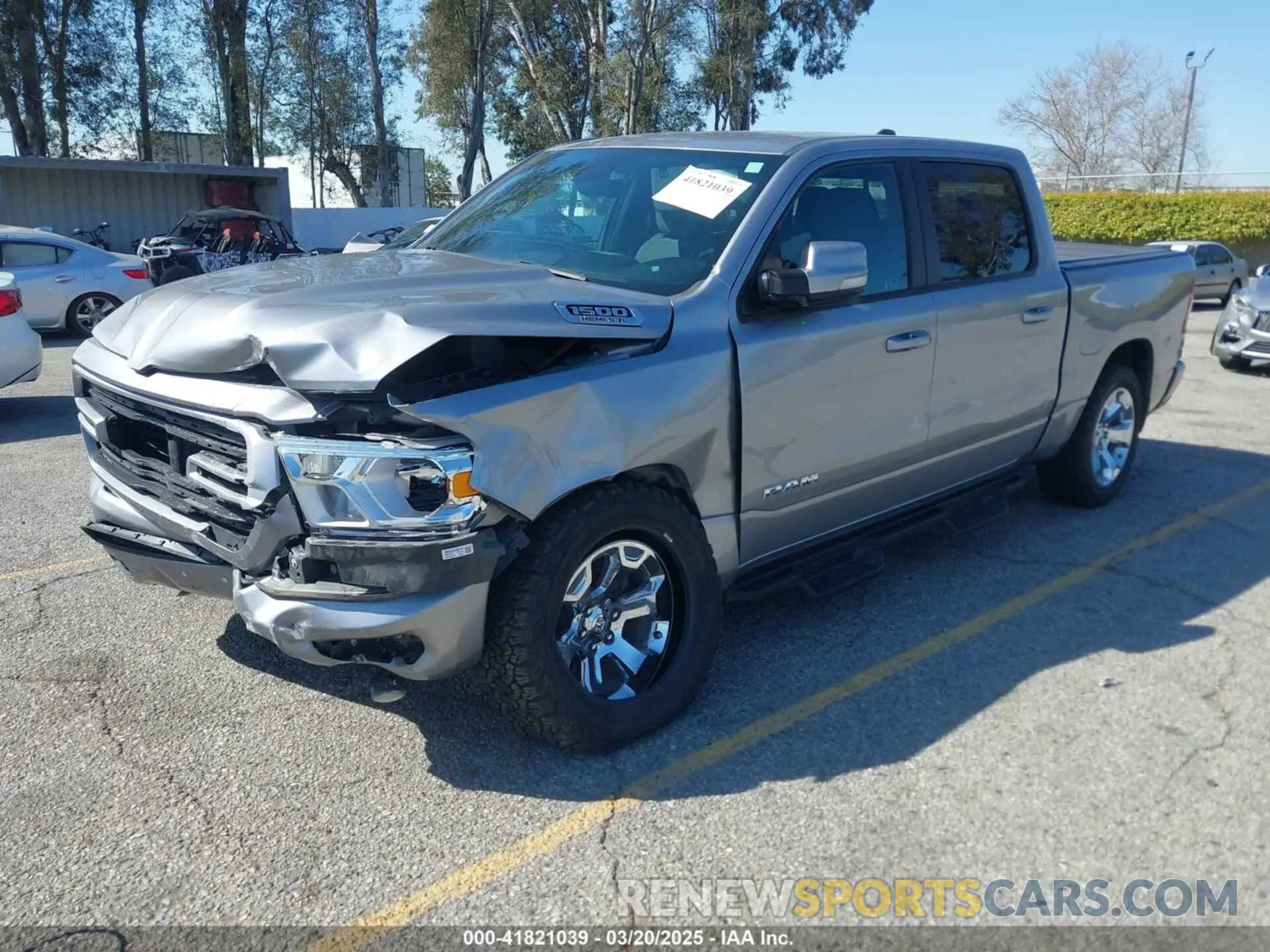2 Photograph of a damaged car 1C6SRFFT4MN688152 RAM 1500 2021