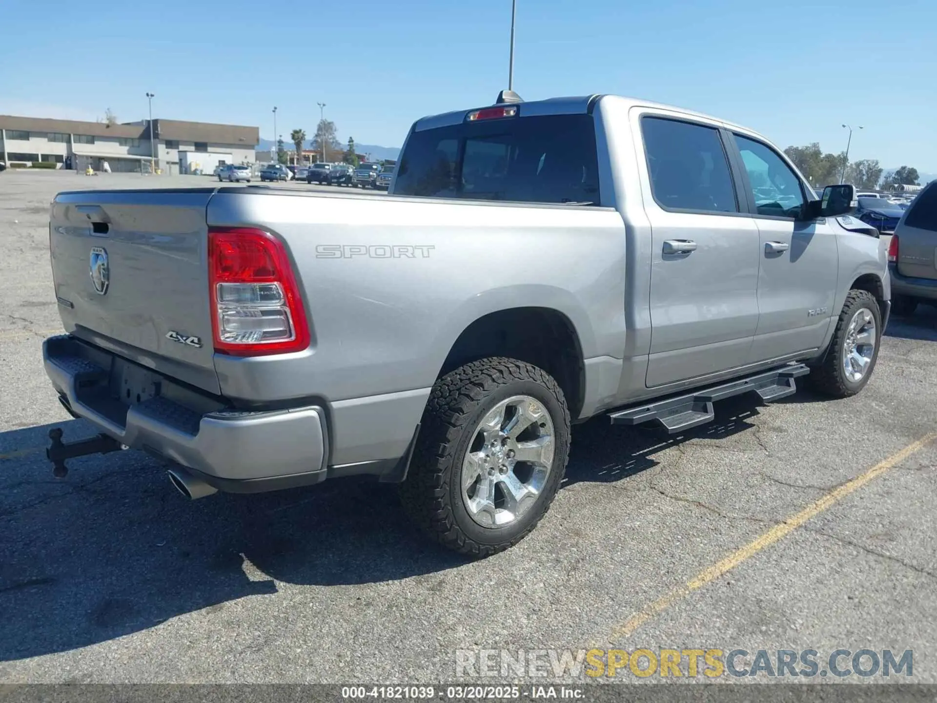 4 Photograph of a damaged car 1C6SRFFT4MN688152 RAM 1500 2021