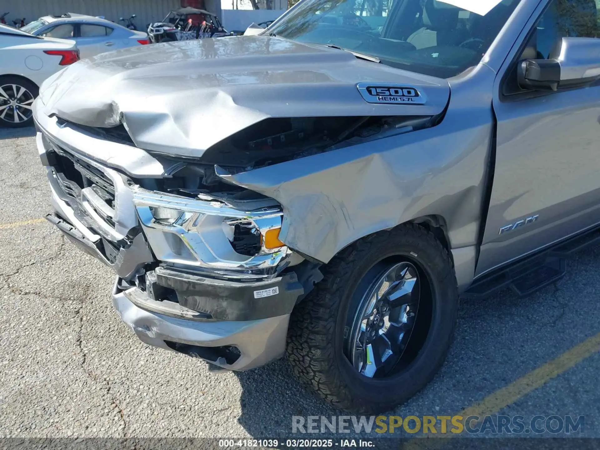 6 Photograph of a damaged car 1C6SRFFT4MN688152 RAM 1500 2021