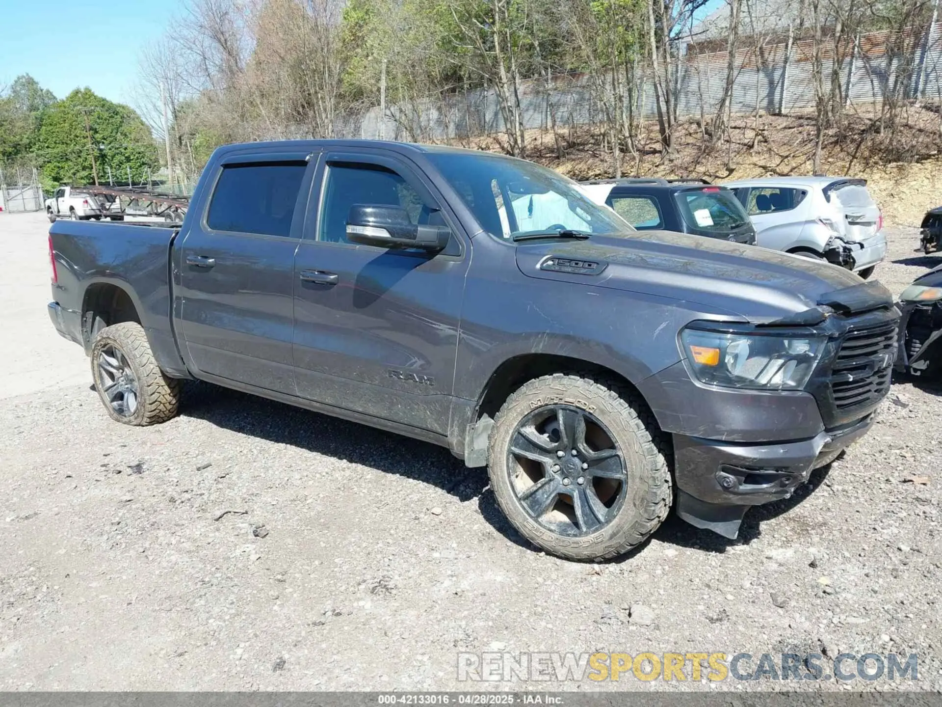 1 Photograph of a damaged car 1C6SRFFT4MN722848 RAM 1500 2021