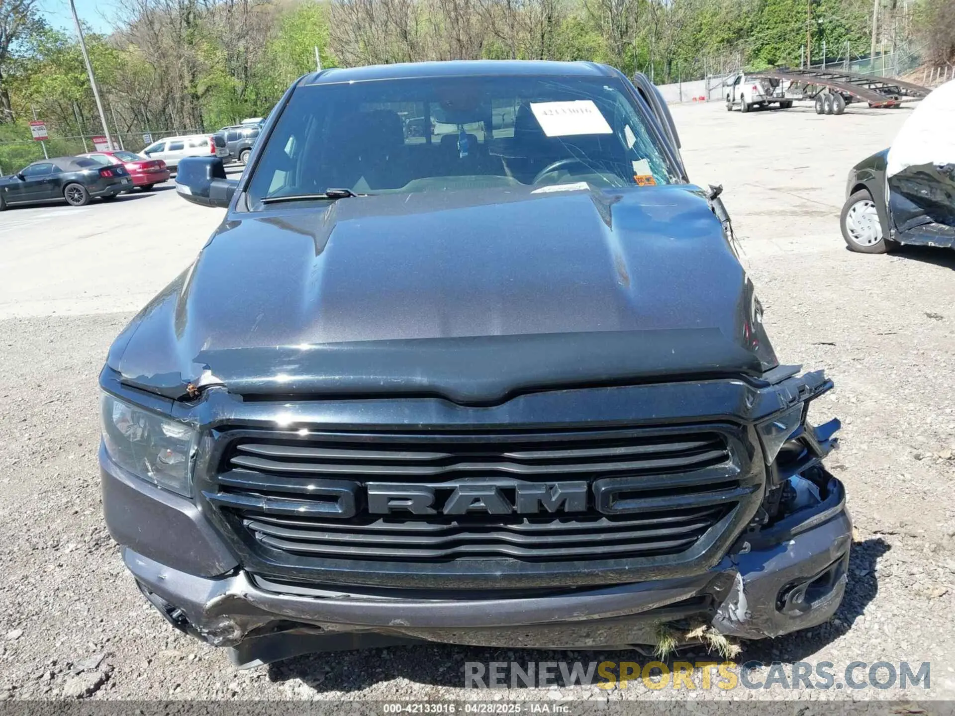 12 Photograph of a damaged car 1C6SRFFT4MN722848 RAM 1500 2021
