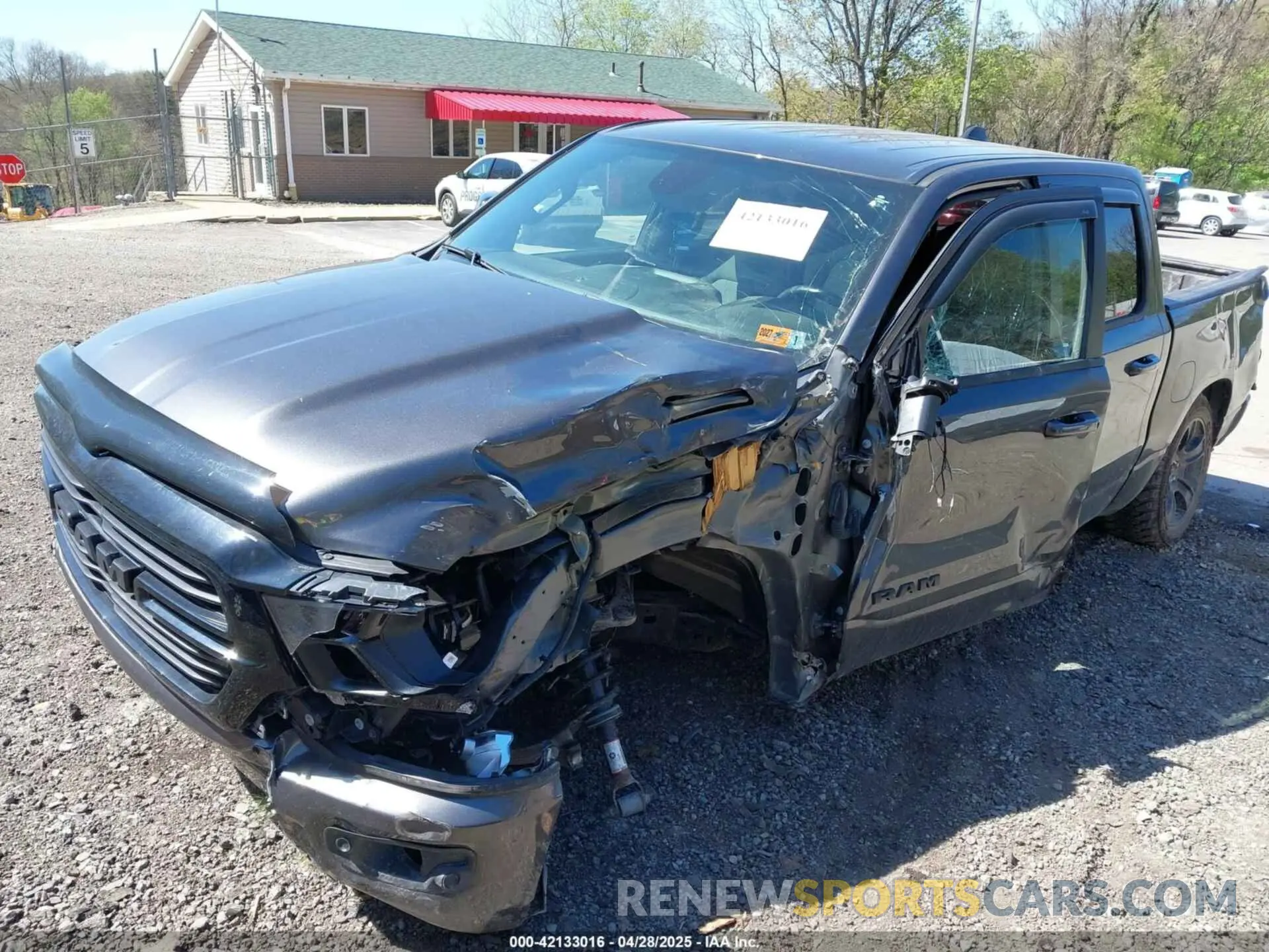 2 Photograph of a damaged car 1C6SRFFT4MN722848 RAM 1500 2021