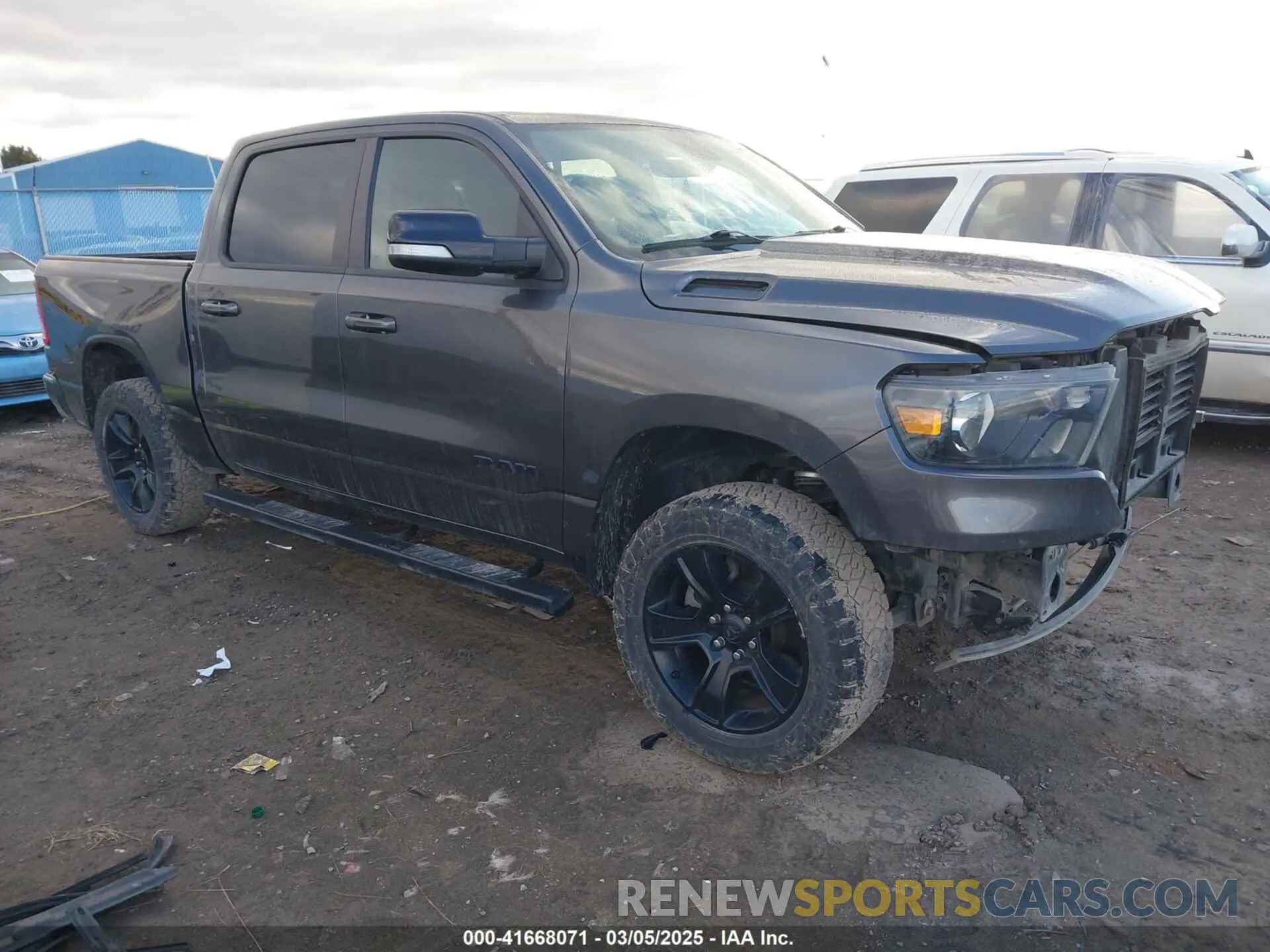 1 Photograph of a damaged car 1C6SRFFT4MN738709 RAM 1500 2021