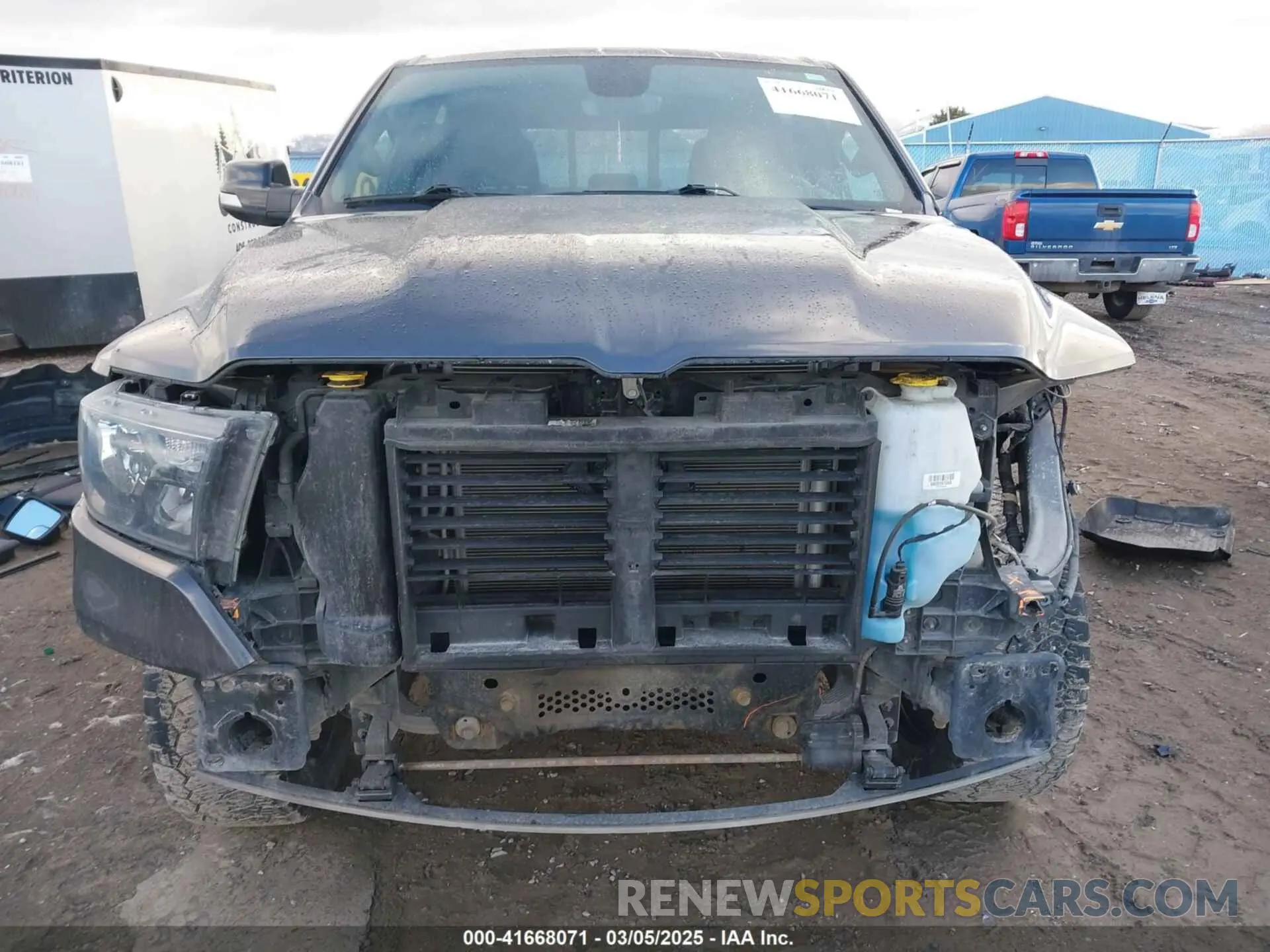 13 Photograph of a damaged car 1C6SRFFT4MN738709 RAM 1500 2021