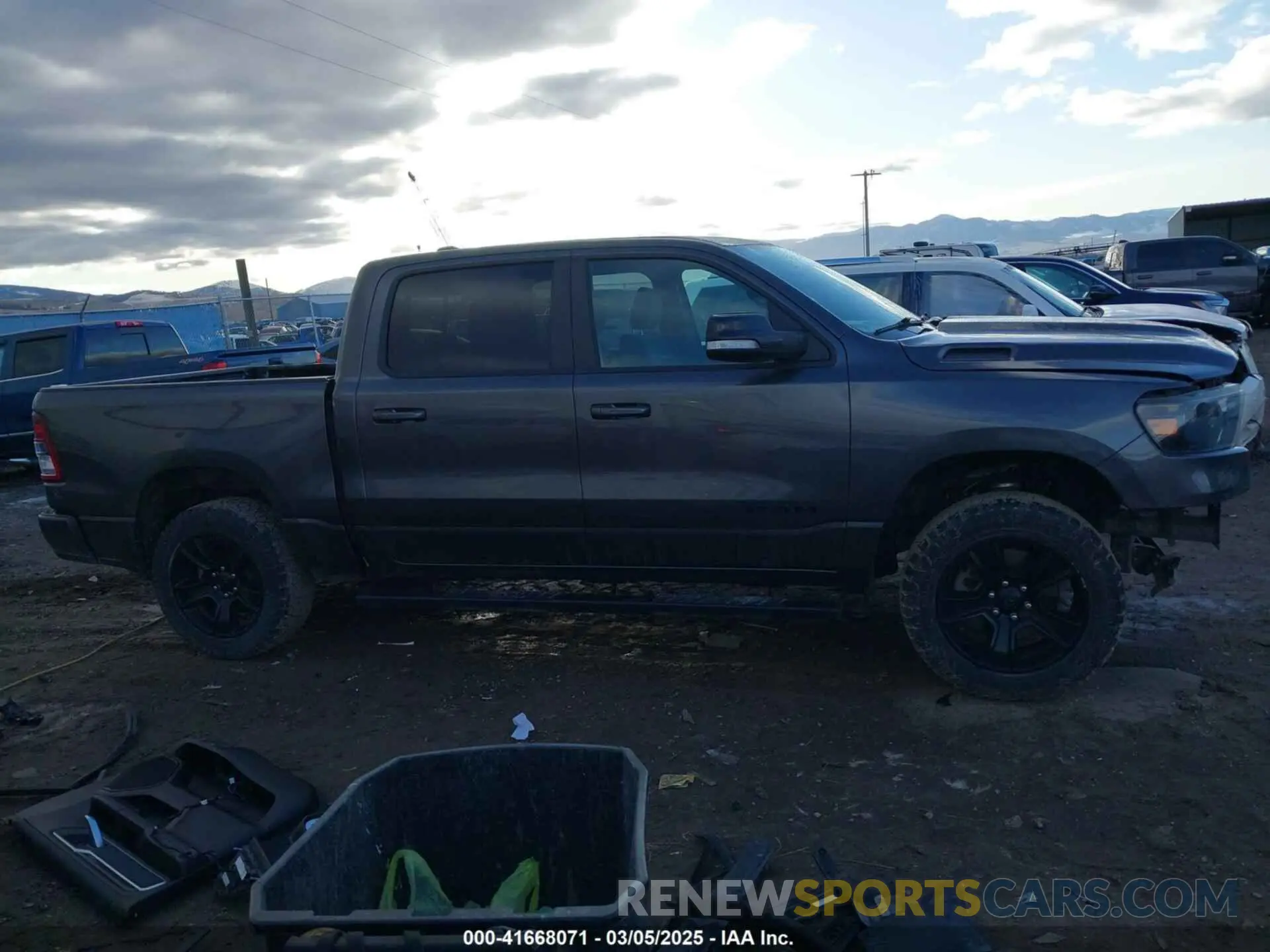 14 Photograph of a damaged car 1C6SRFFT4MN738709 RAM 1500 2021