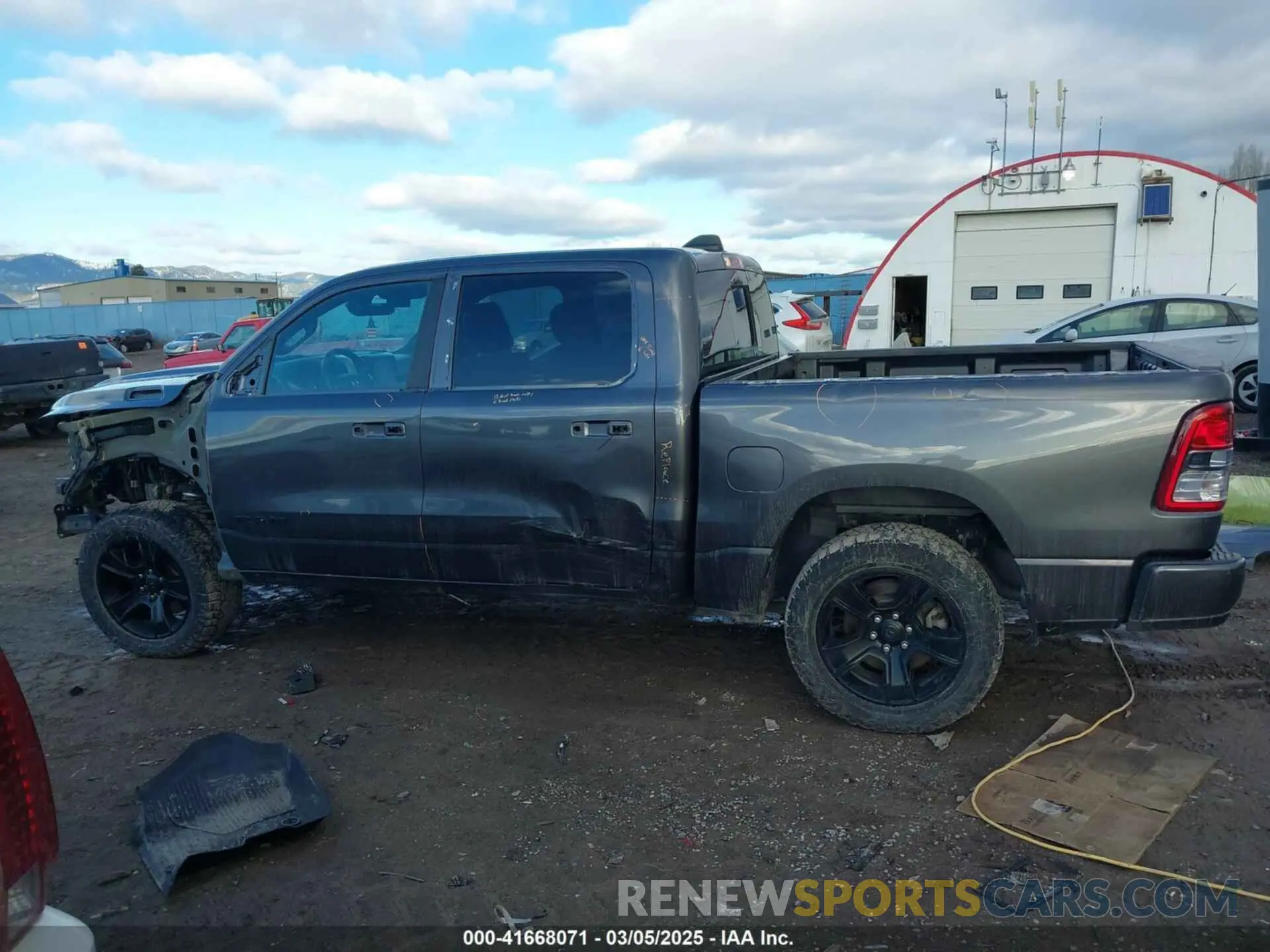 15 Photograph of a damaged car 1C6SRFFT4MN738709 RAM 1500 2021