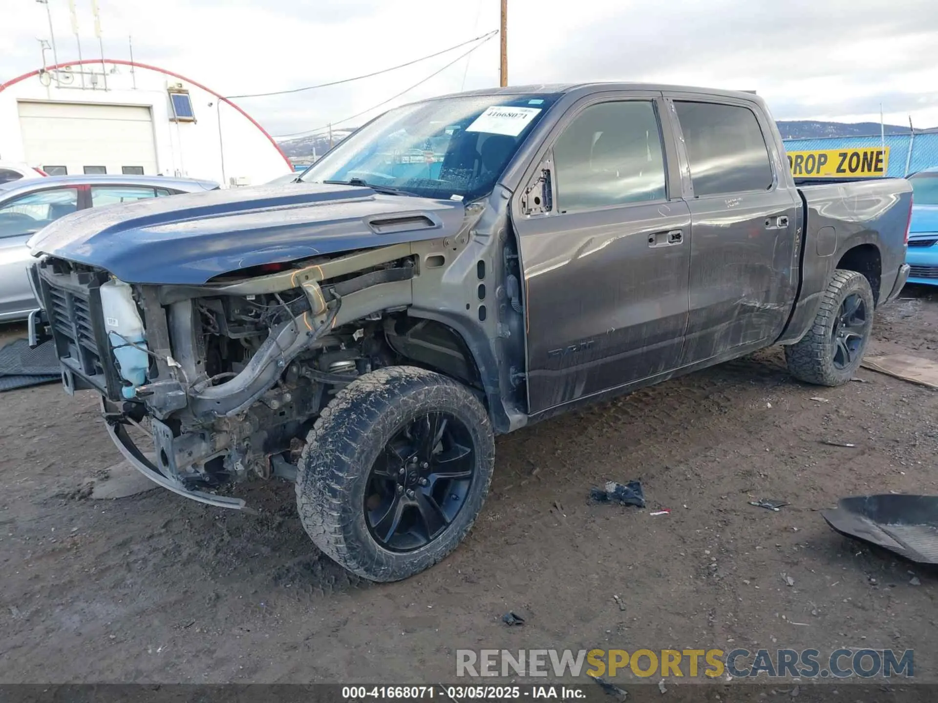 2 Photograph of a damaged car 1C6SRFFT4MN738709 RAM 1500 2021