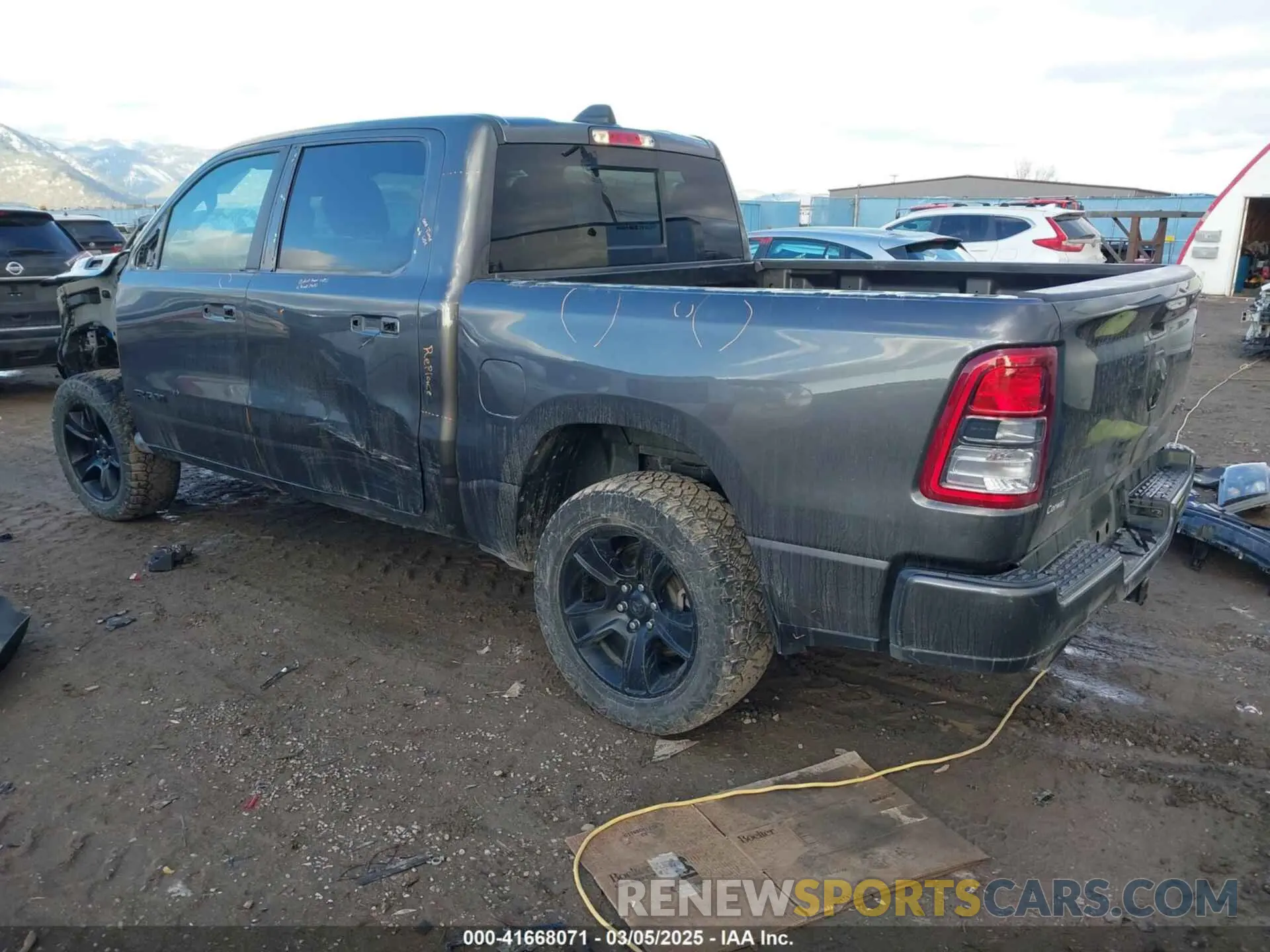 3 Photograph of a damaged car 1C6SRFFT4MN738709 RAM 1500 2021