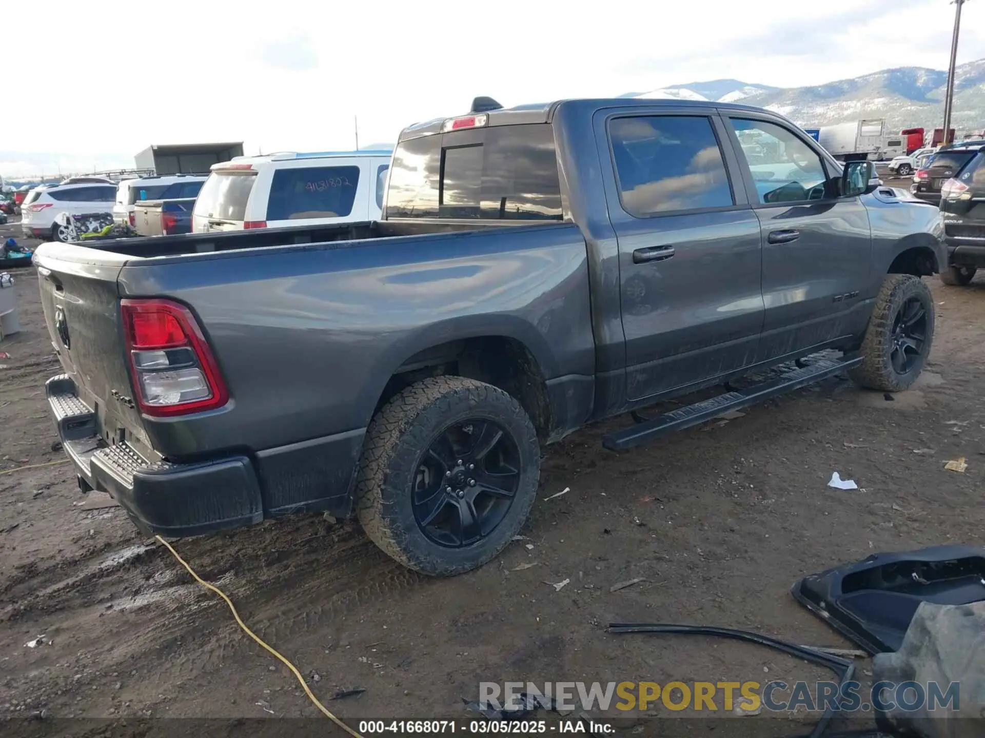 4 Photograph of a damaged car 1C6SRFFT4MN738709 RAM 1500 2021