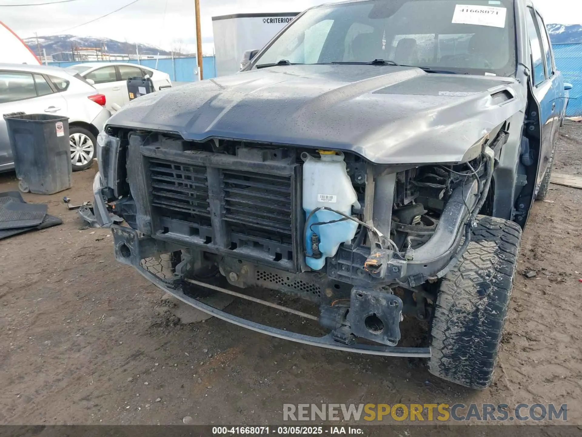 6 Photograph of a damaged car 1C6SRFFT4MN738709 RAM 1500 2021