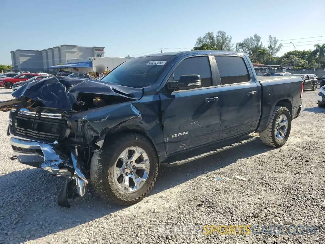 1 Photograph of a damaged car 1C6SRFFT4MN745448 RAM 1500 2021