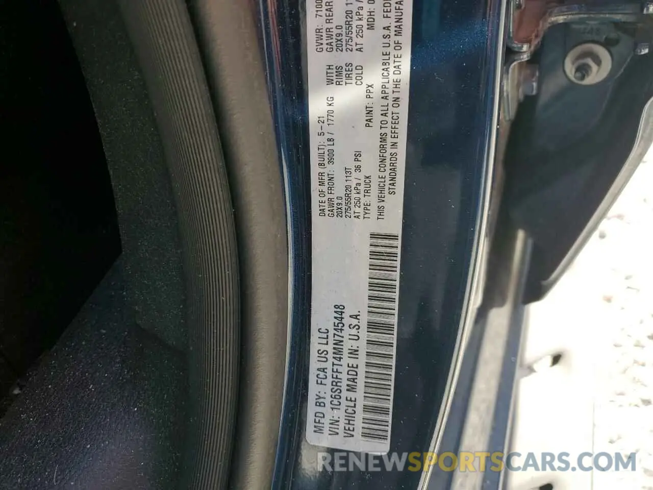 14 Photograph of a damaged car 1C6SRFFT4MN745448 RAM 1500 2021