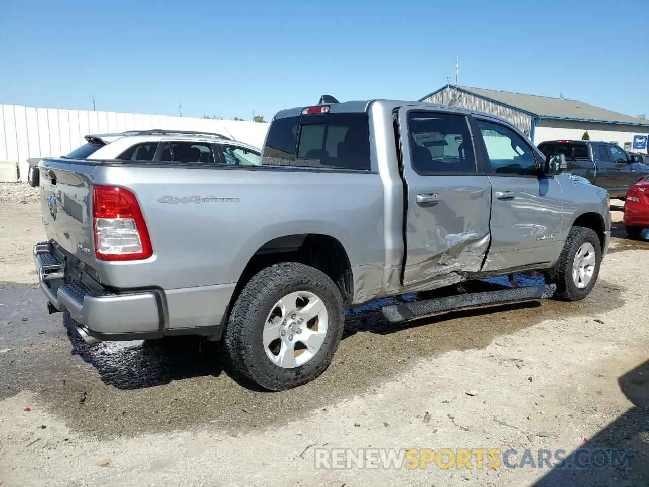 3 Photograph of a damaged car 1C6SRFFT4MN773248 RAM 1500 2021