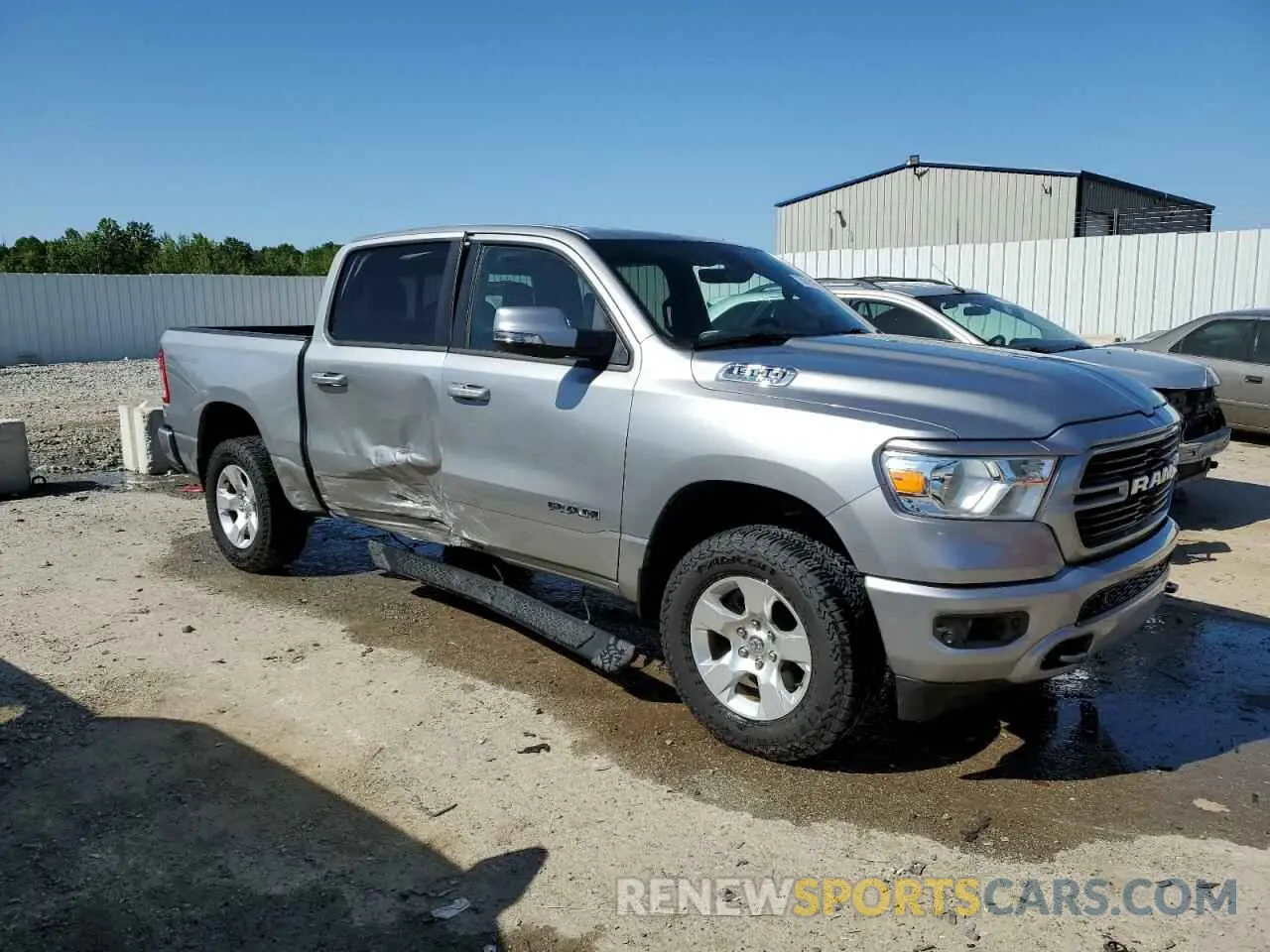 4 Photograph of a damaged car 1C6SRFFT4MN773248 RAM 1500 2021