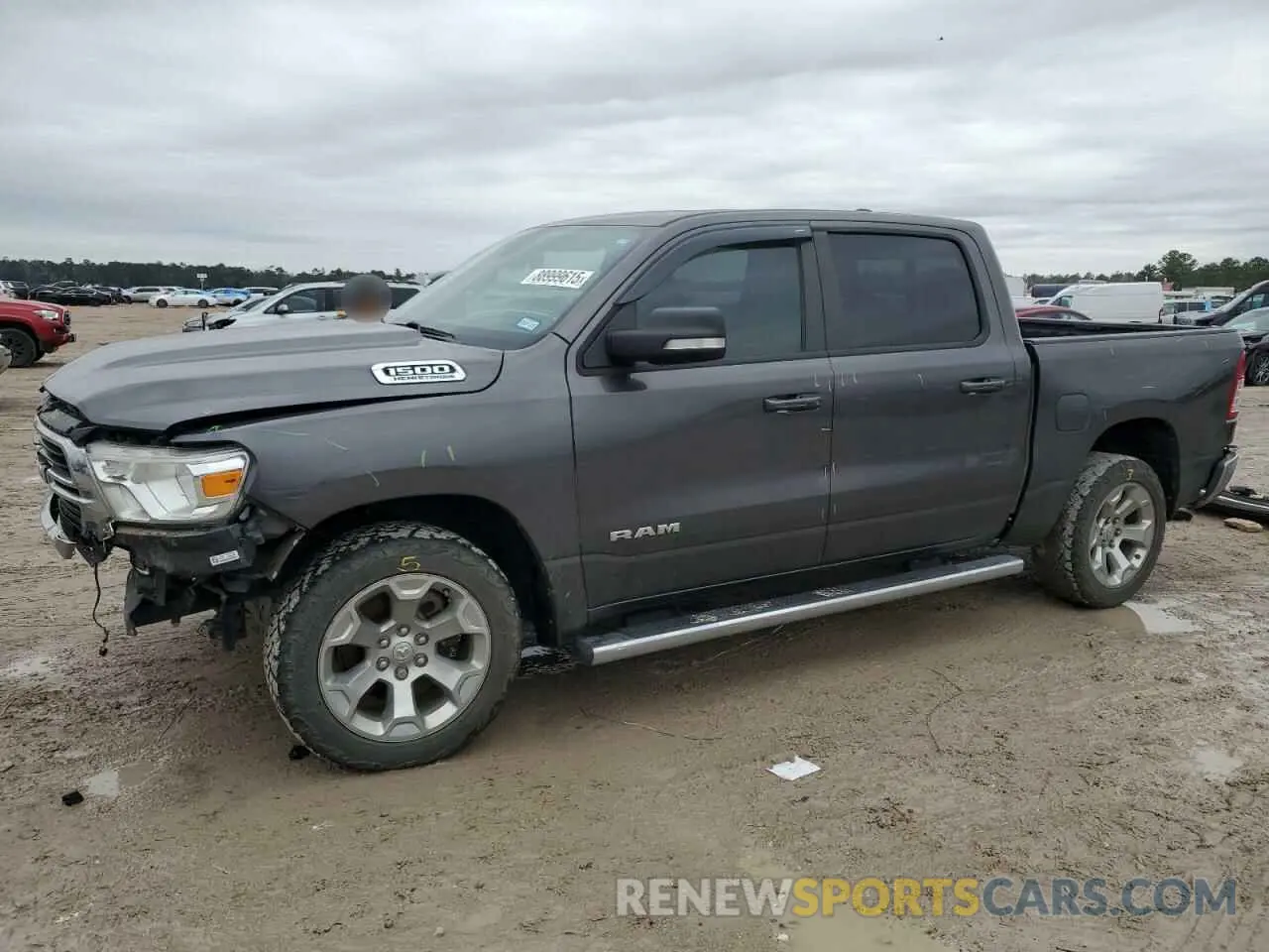 1 Photograph of a damaged car 1C6SRFFT4MN796450 RAM 1500 2021