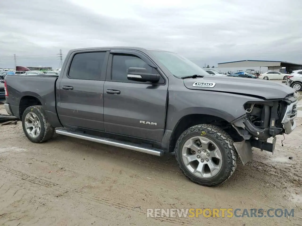 4 Photograph of a damaged car 1C6SRFFT4MN796450 RAM 1500 2021